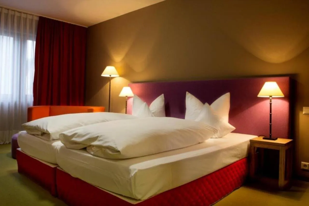 Photo of the whole room, Bed in Schurwald Hotel