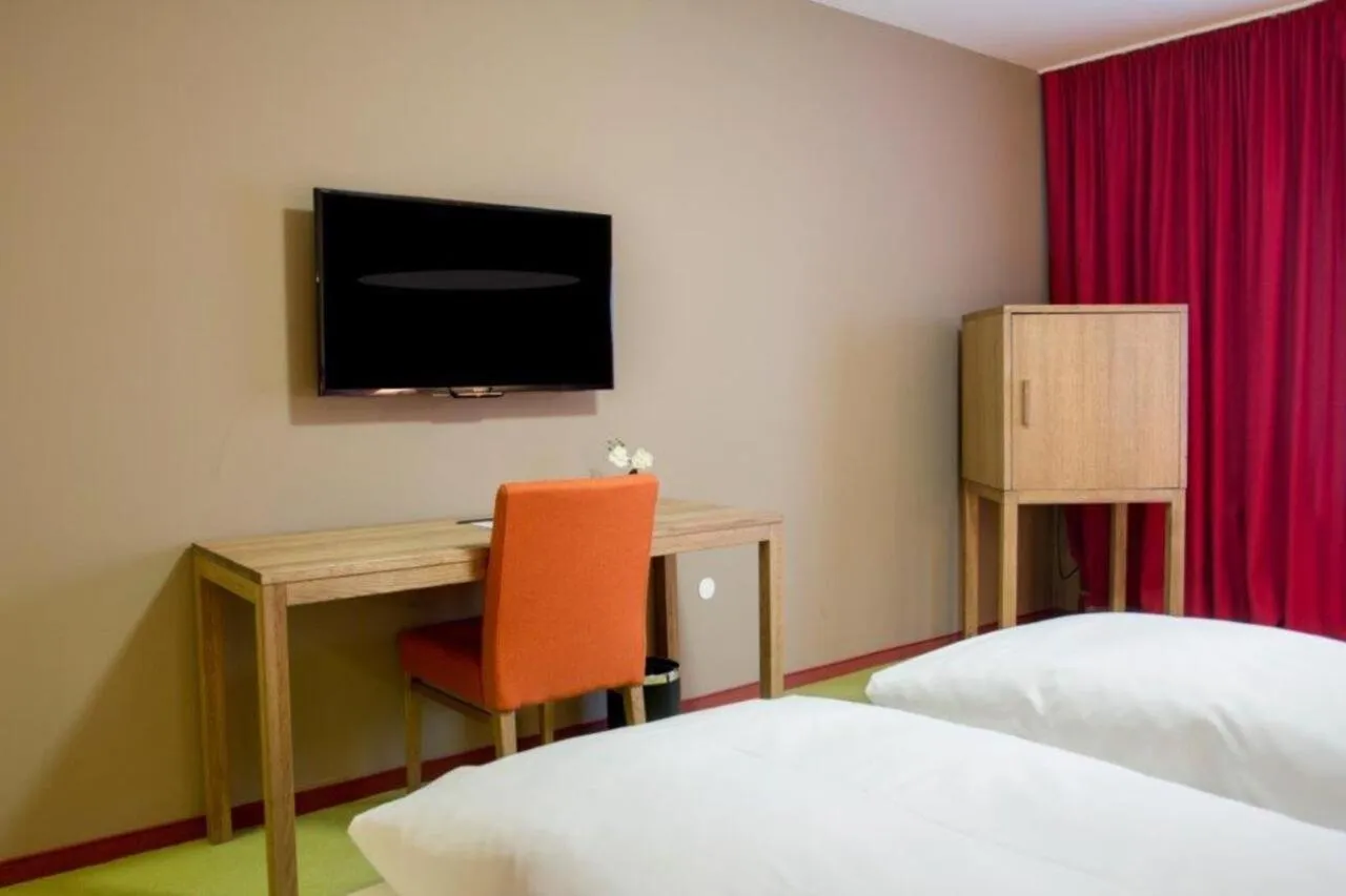 Photo of the whole room, Bed in Schurwald Hotel