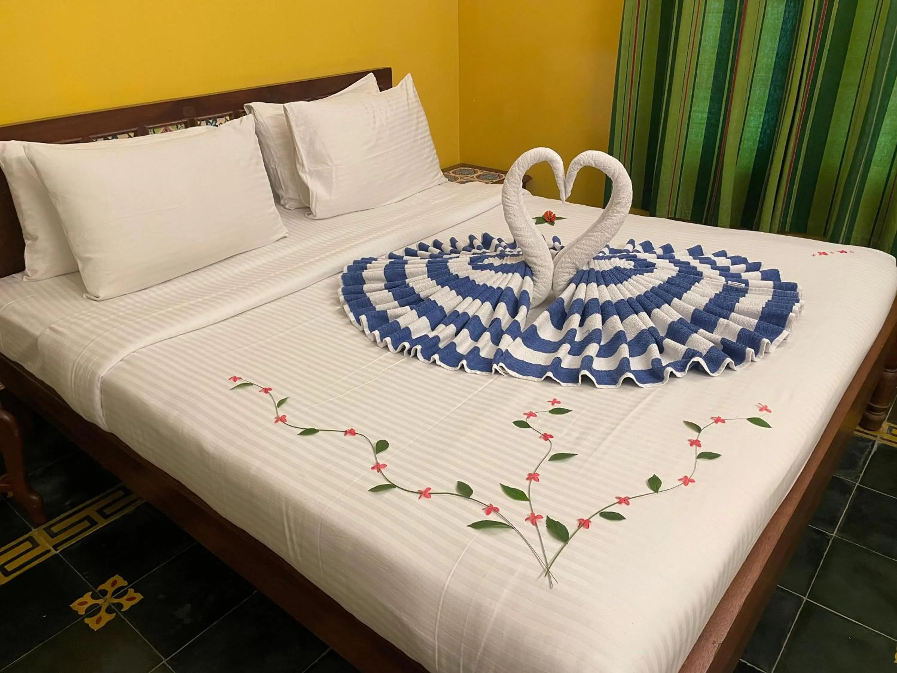 Bed in Marutham Village Resort