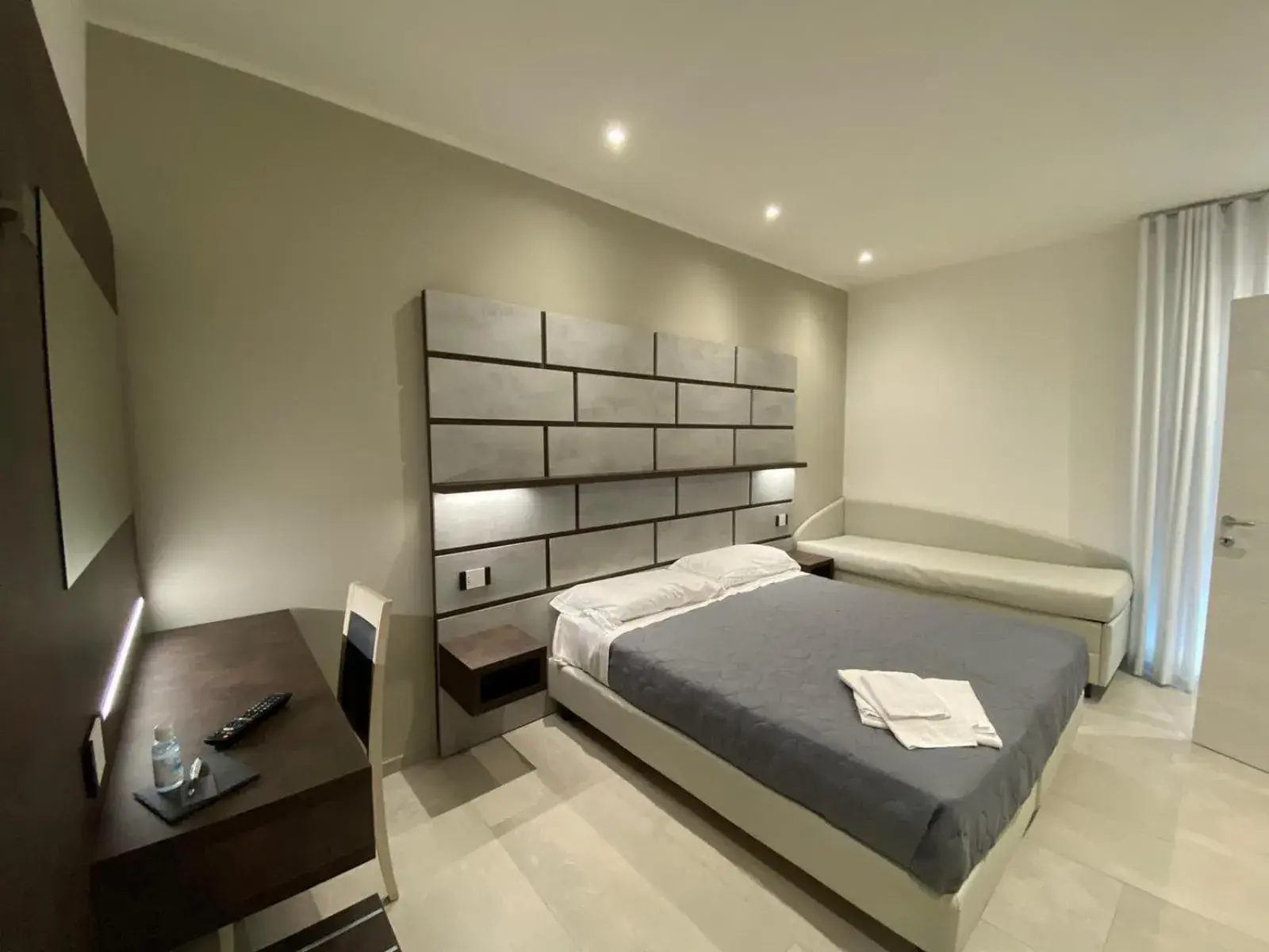 Quadruple Room with Private Bathroom in B&B Bertani Quadruple Room with Private Bathroom in B&B Bertani