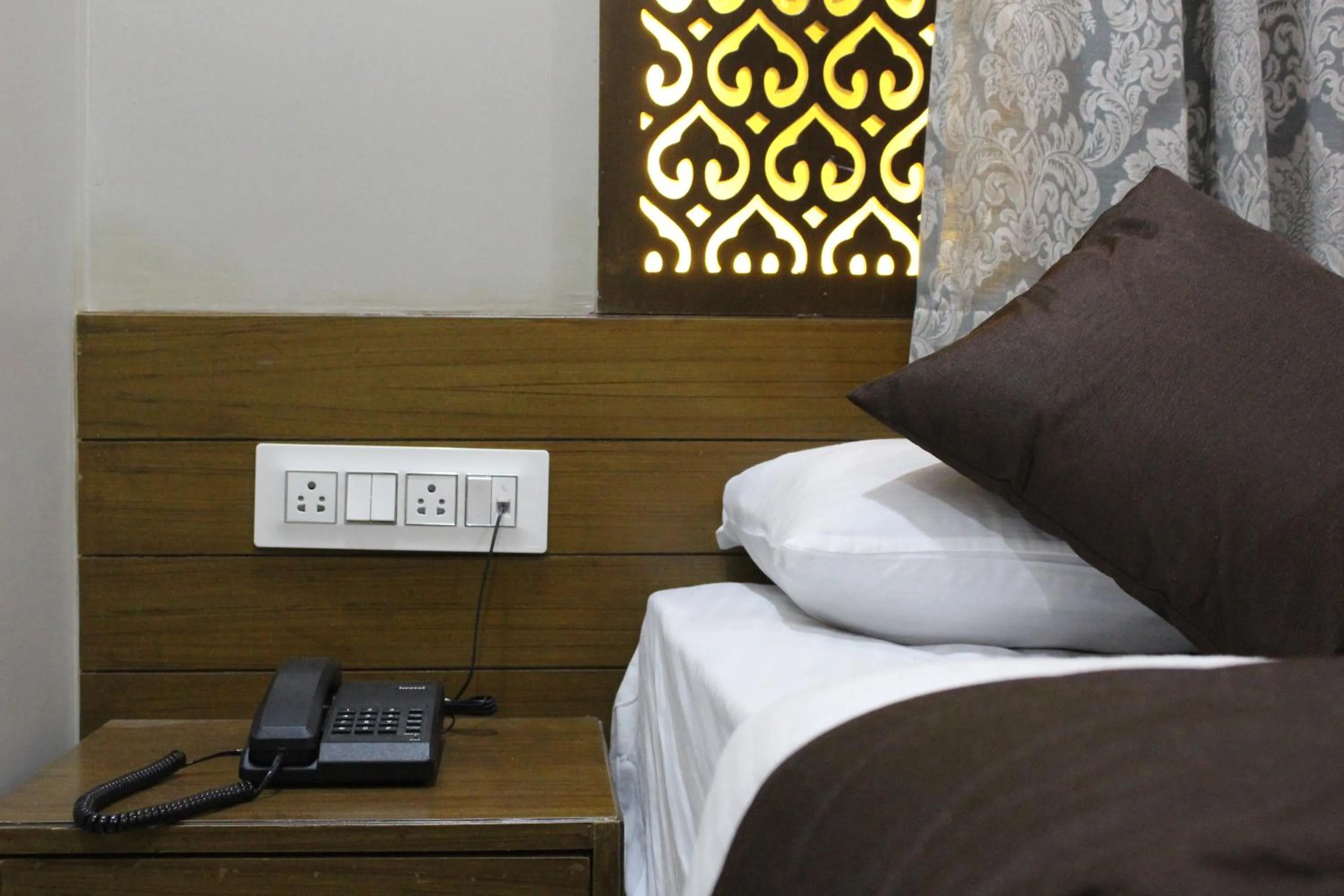 Bed in Olivia Inn And Suites