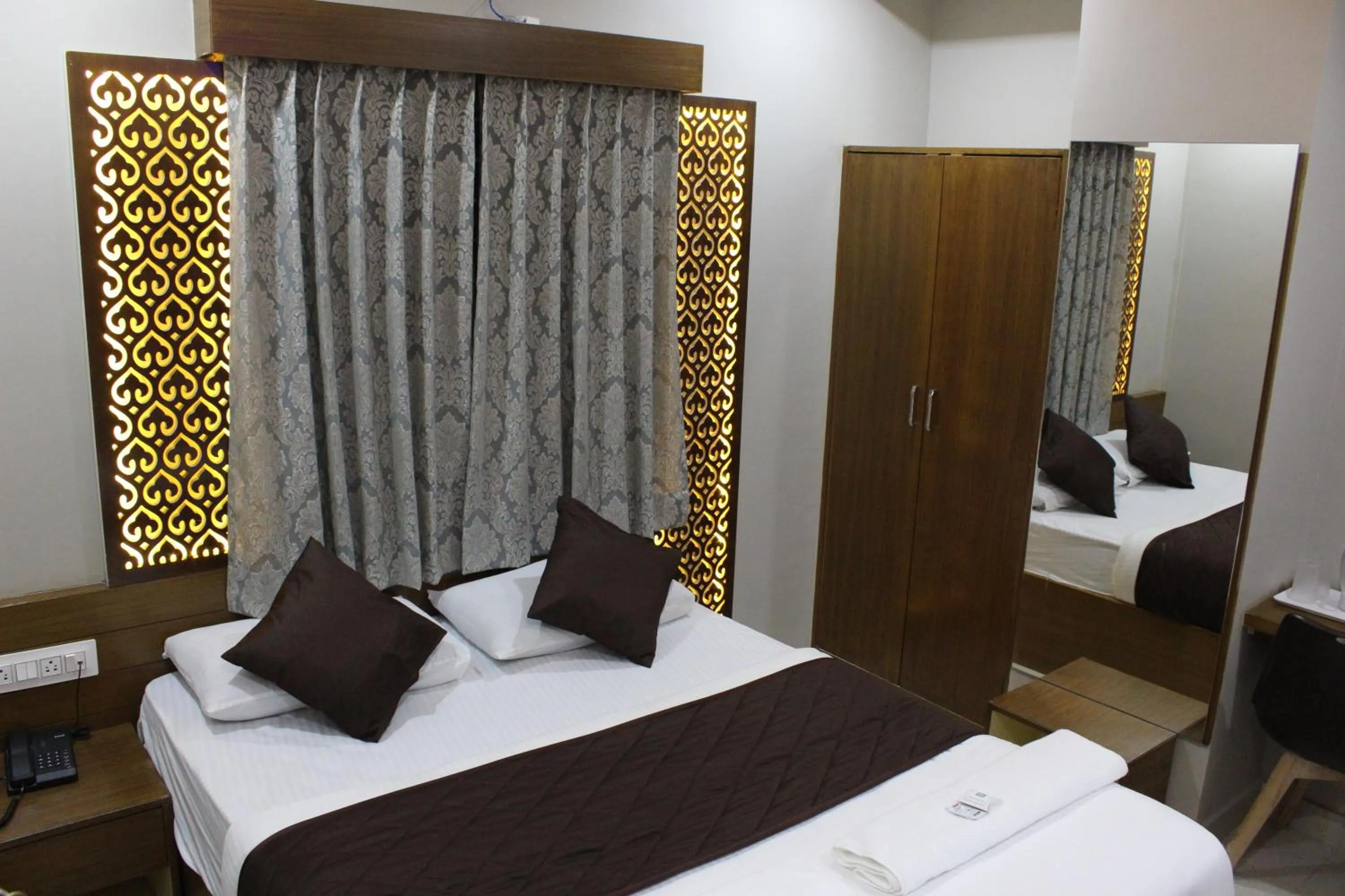 Bed in Olivia Inn And Suites