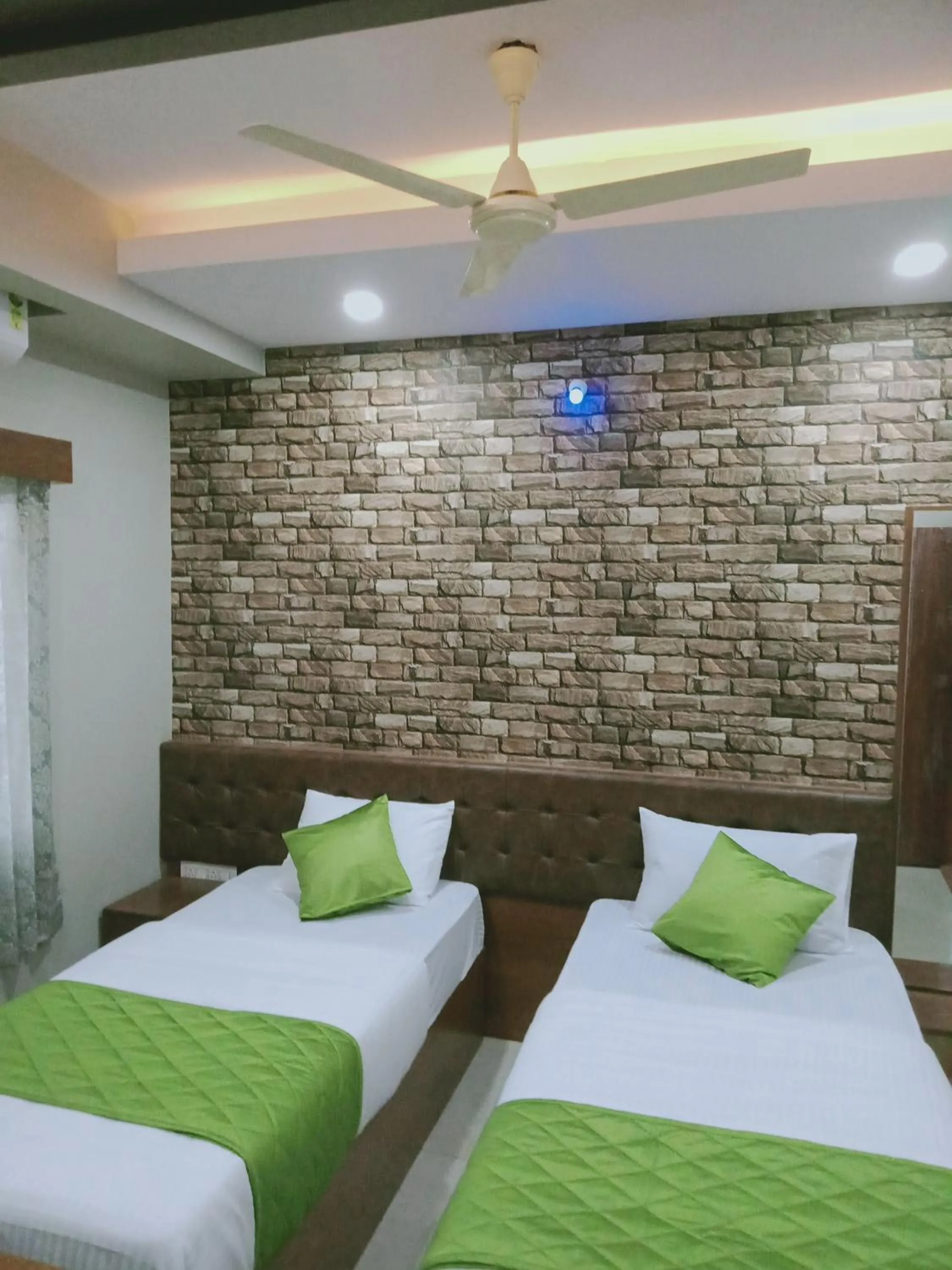 Staff, Bed in Olivia Inn And Suites