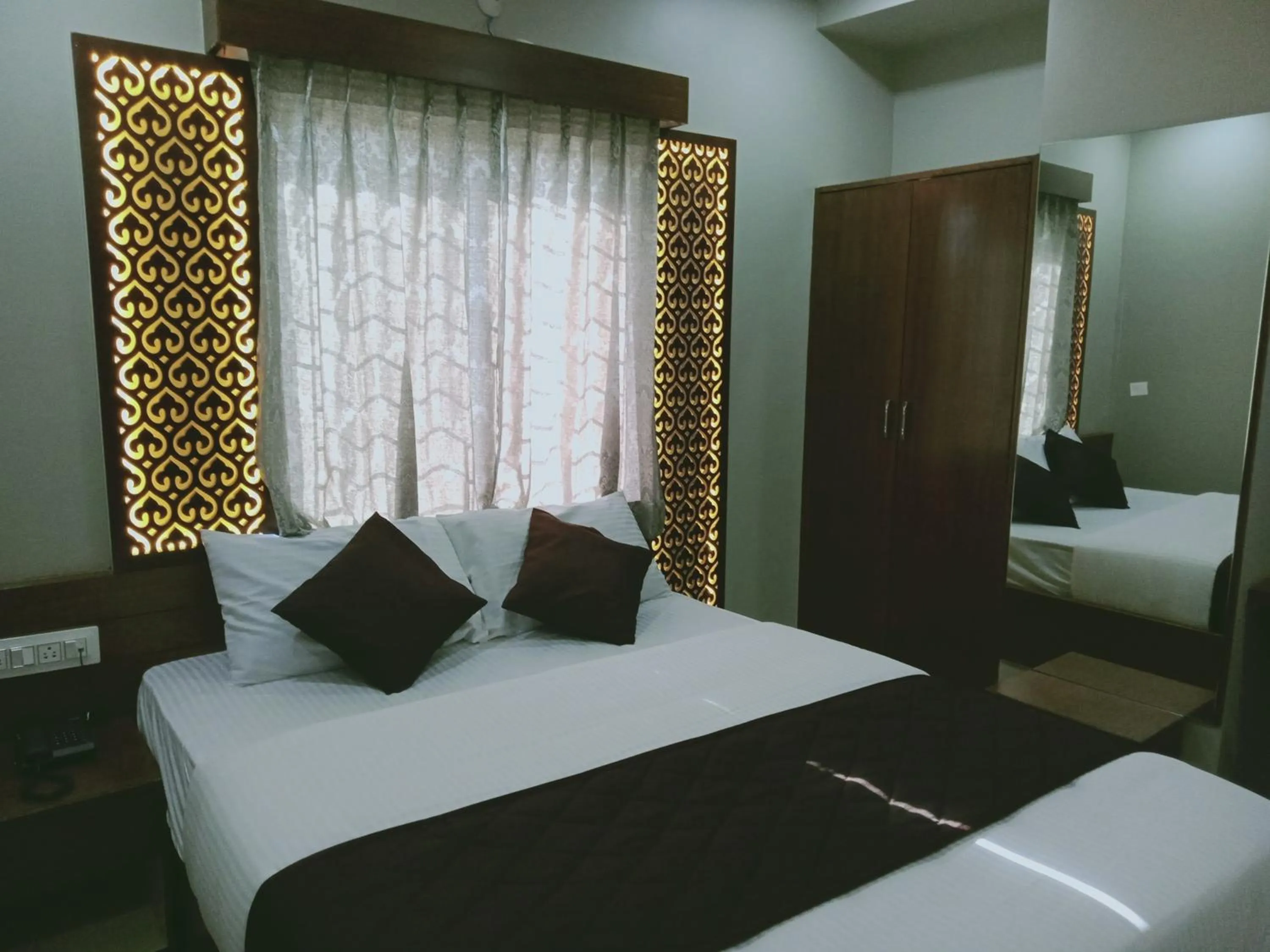 Bed in Olivia Inn And Suites