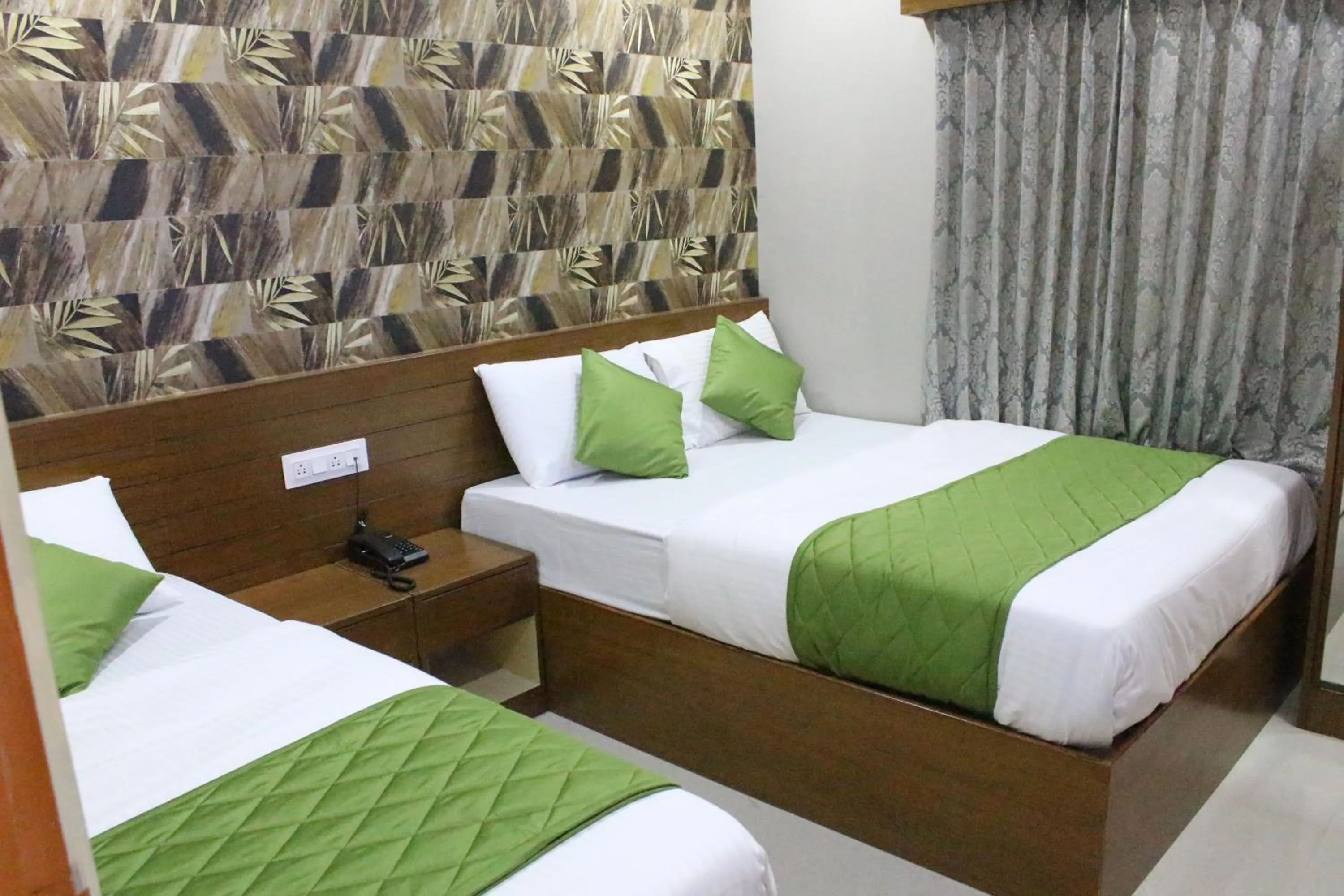 Bed in Olivia Inn And Suites