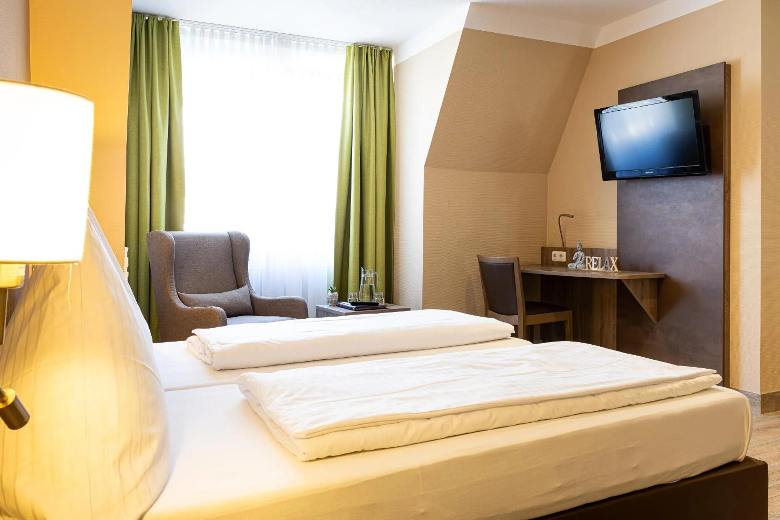 Photo of the whole room, Bed in Hotel Aulmann