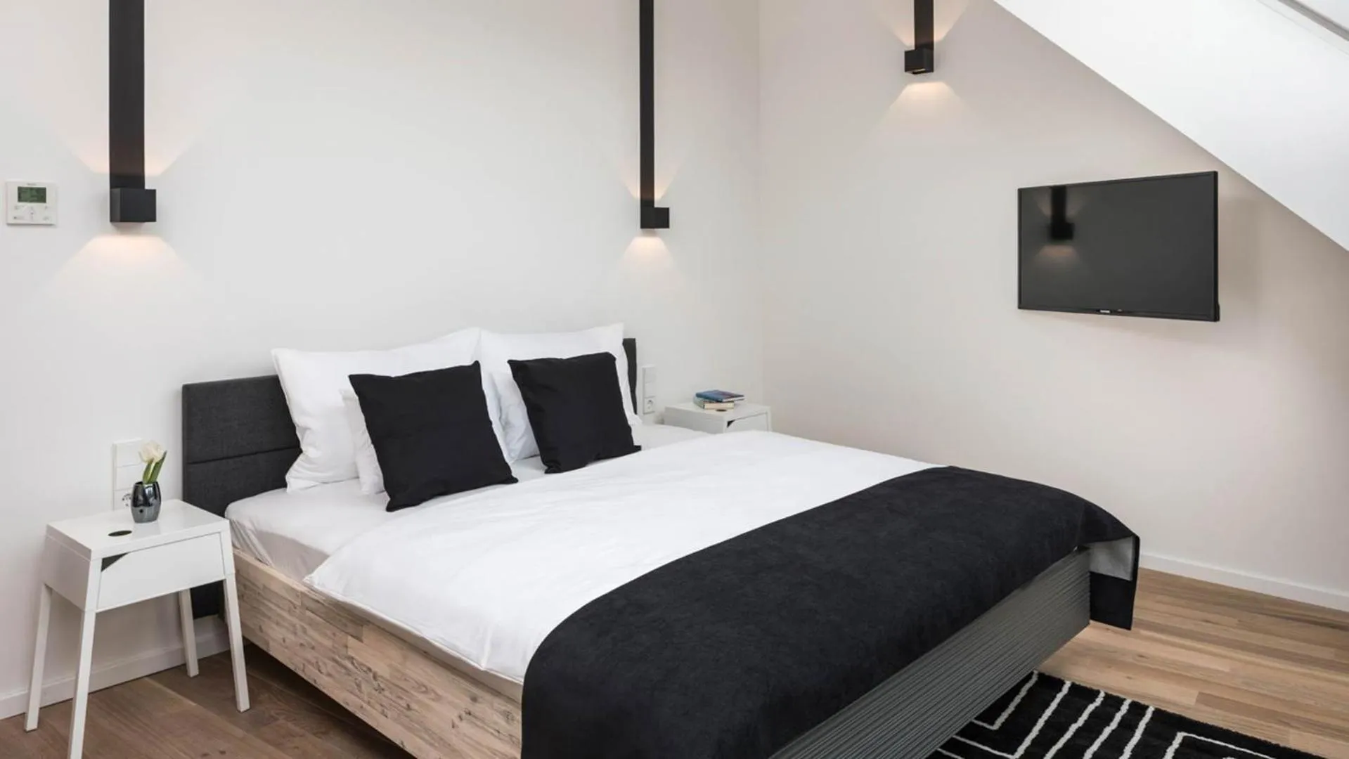 Bed in Blackhome Graz I contactless check-in
