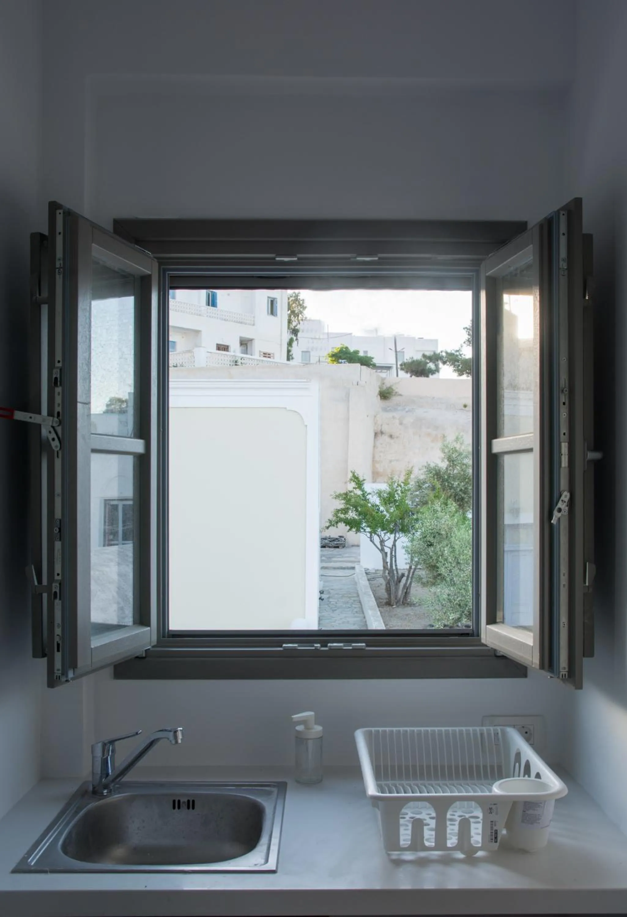 Kitchen or kitchenette in Amphitrite Suites Santorini