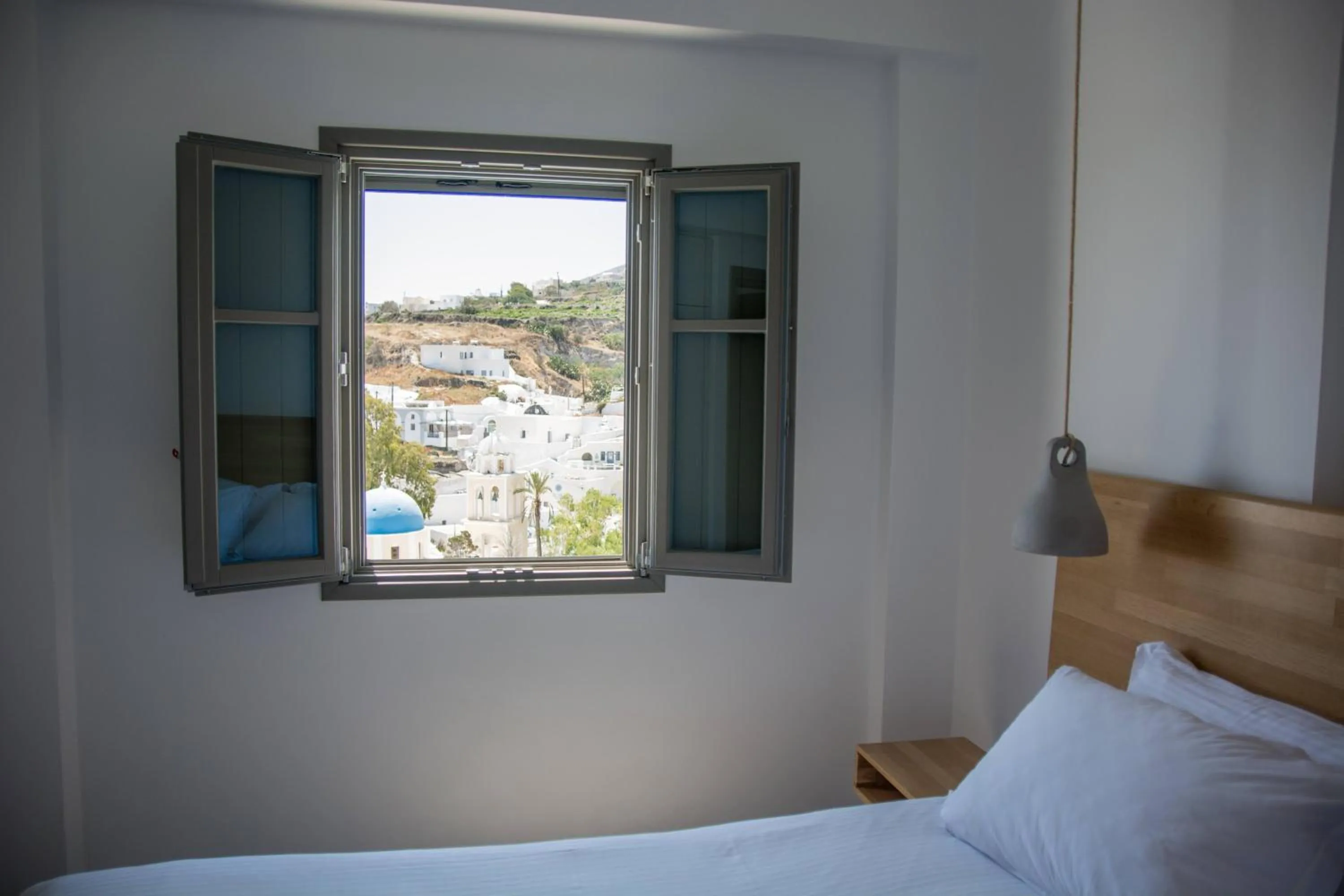 View (from property/room), Bed in Amphitrite Suites Santorini