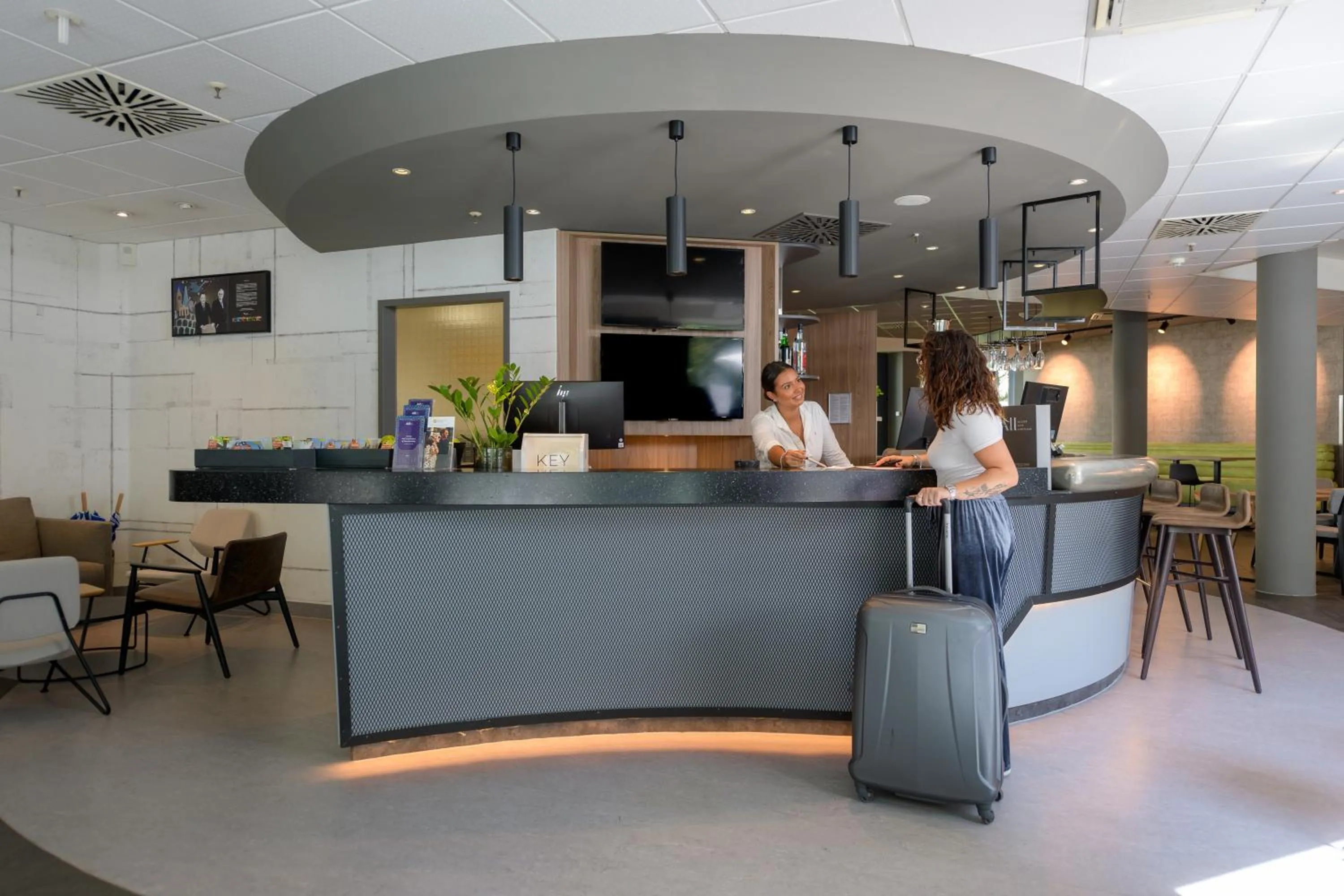 Lobby or reception in Novotel Suites München Parkstadt Schwabing