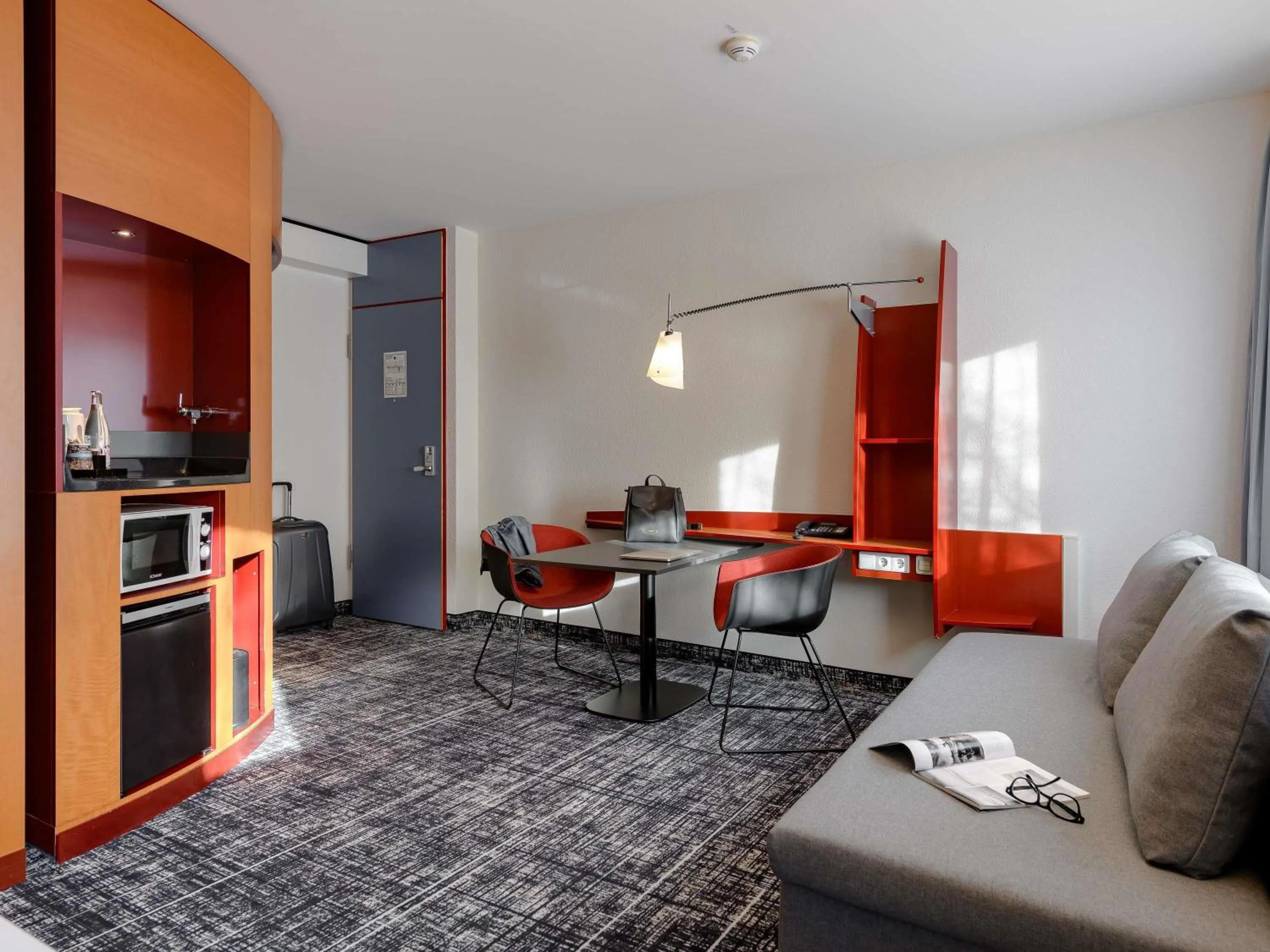 Bedroom in Novotel Suites München Parkstadt Schwabing