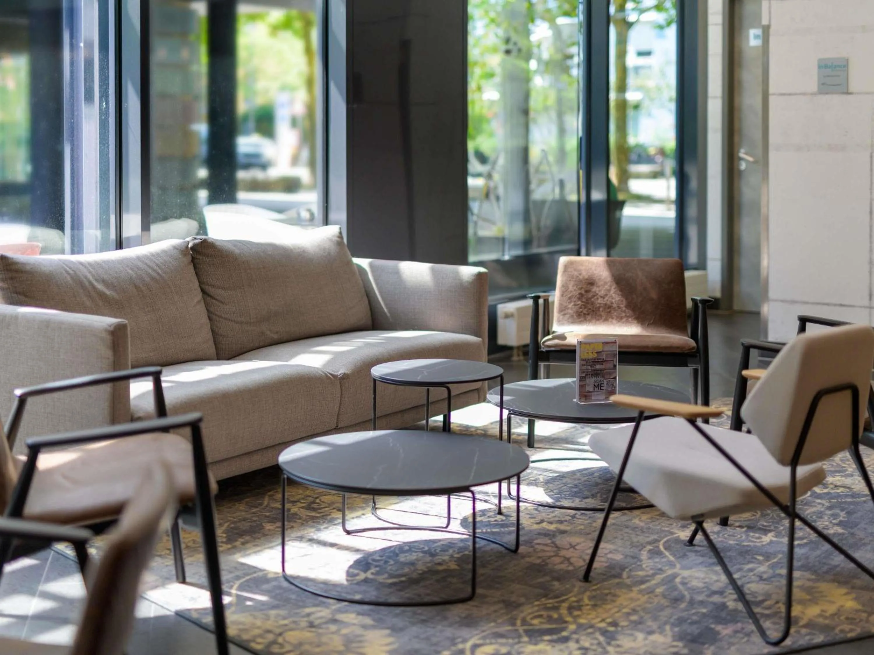 Lounge or bar in Novotel Suites München Parkstadt Schwabing