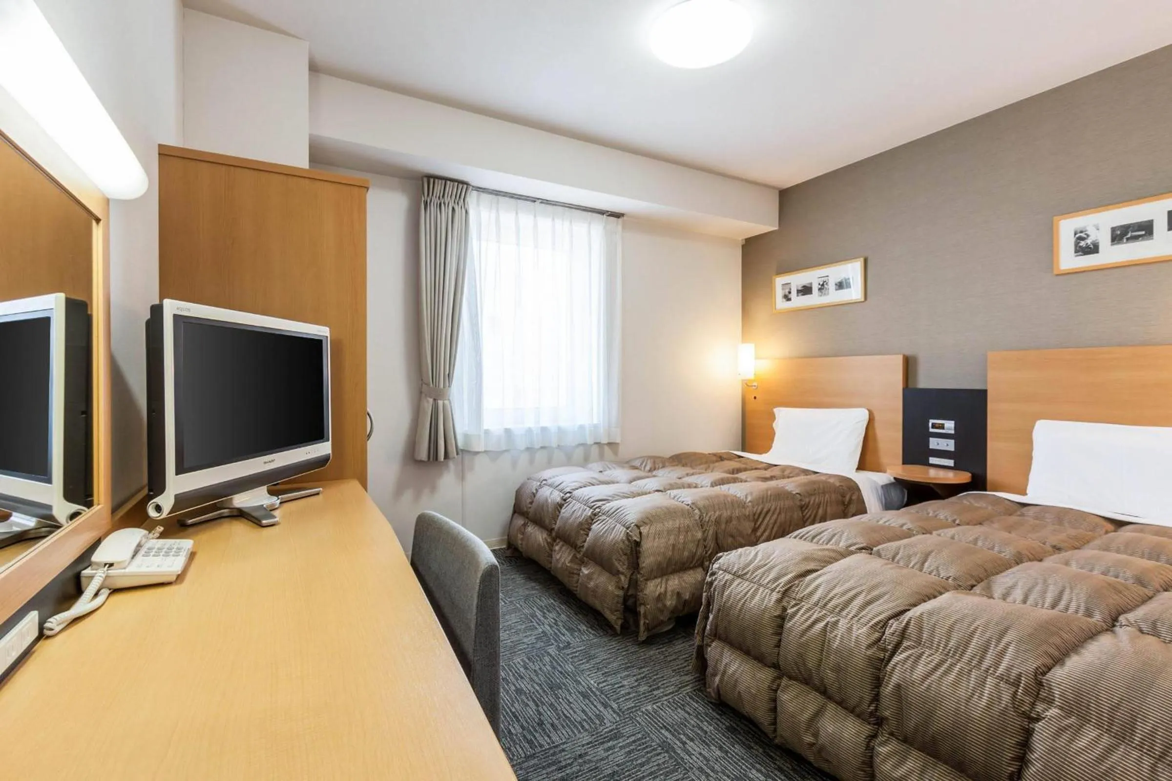 Bedroom, Bed in Comfort Hotel Kushiro