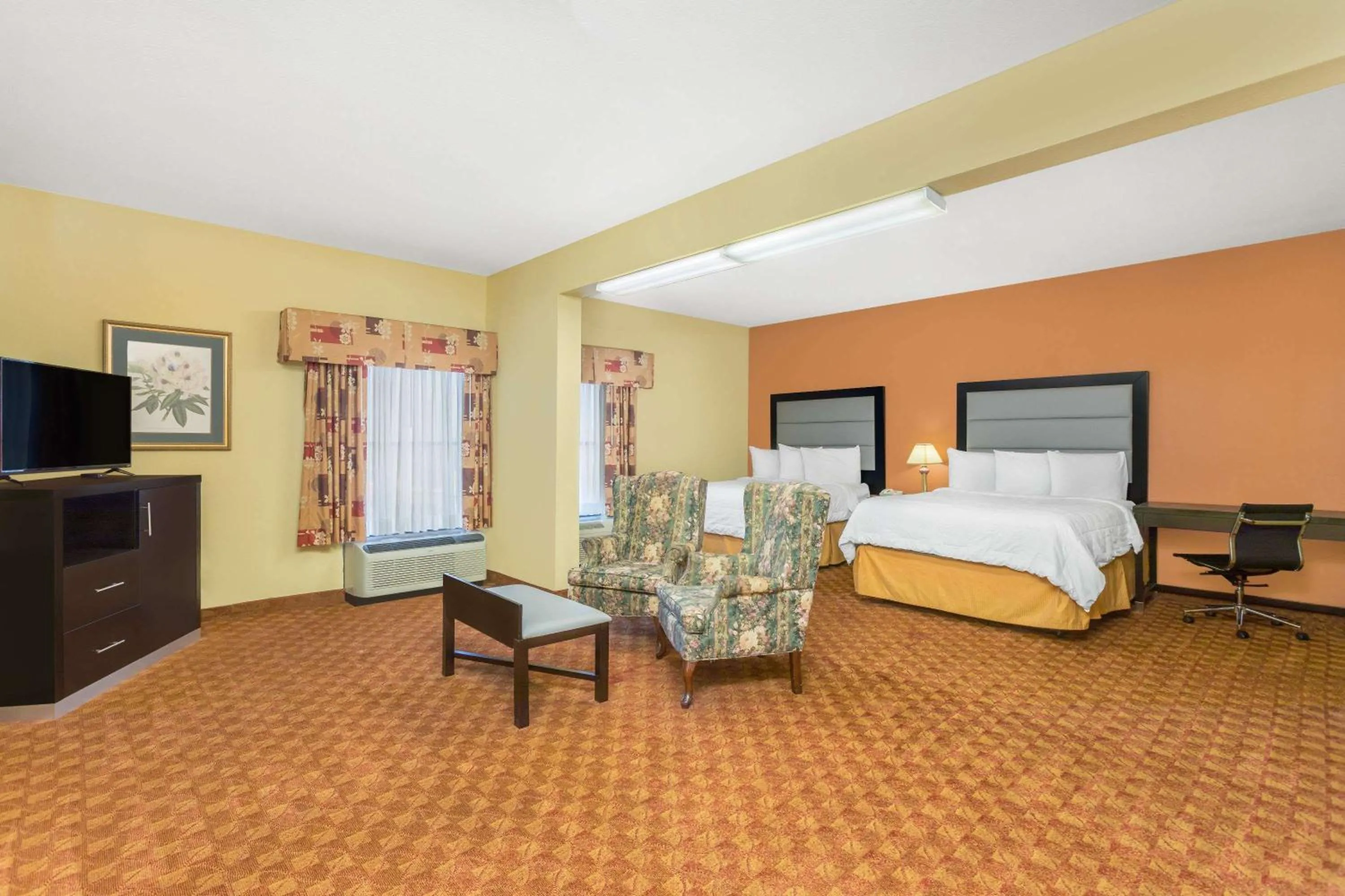 Photo of the whole room, Bed in Baymont by Wyndham Fayetteville