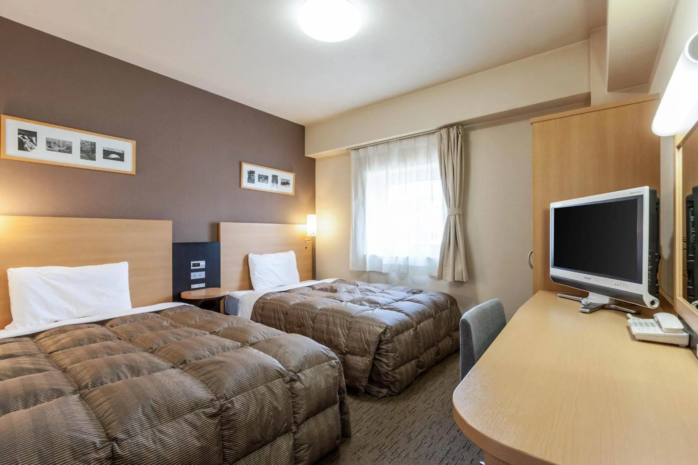Bedroom, Bed in Comfort Hotel Obihiro