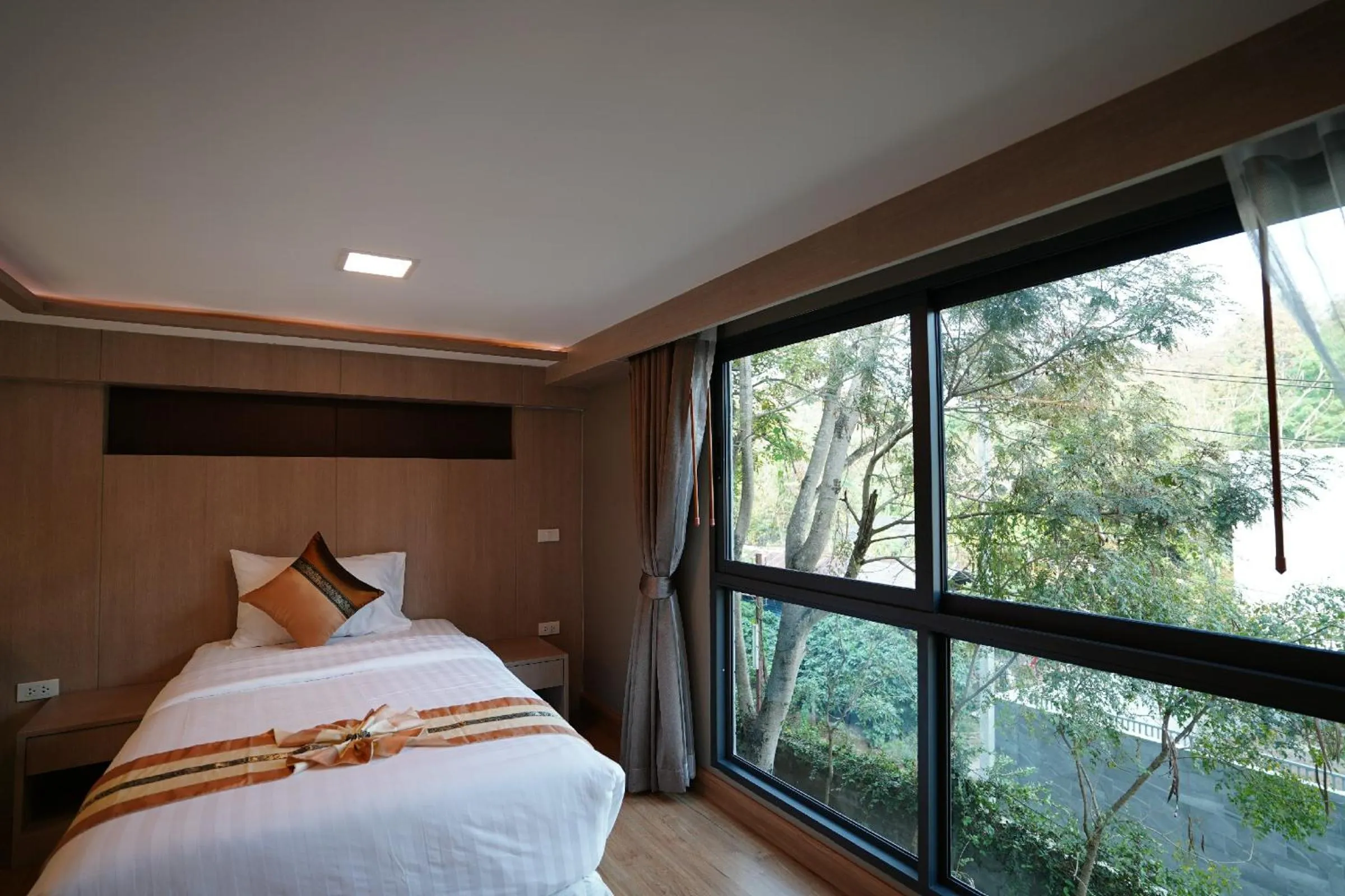 Bed in Treescape Resort Chiangmai