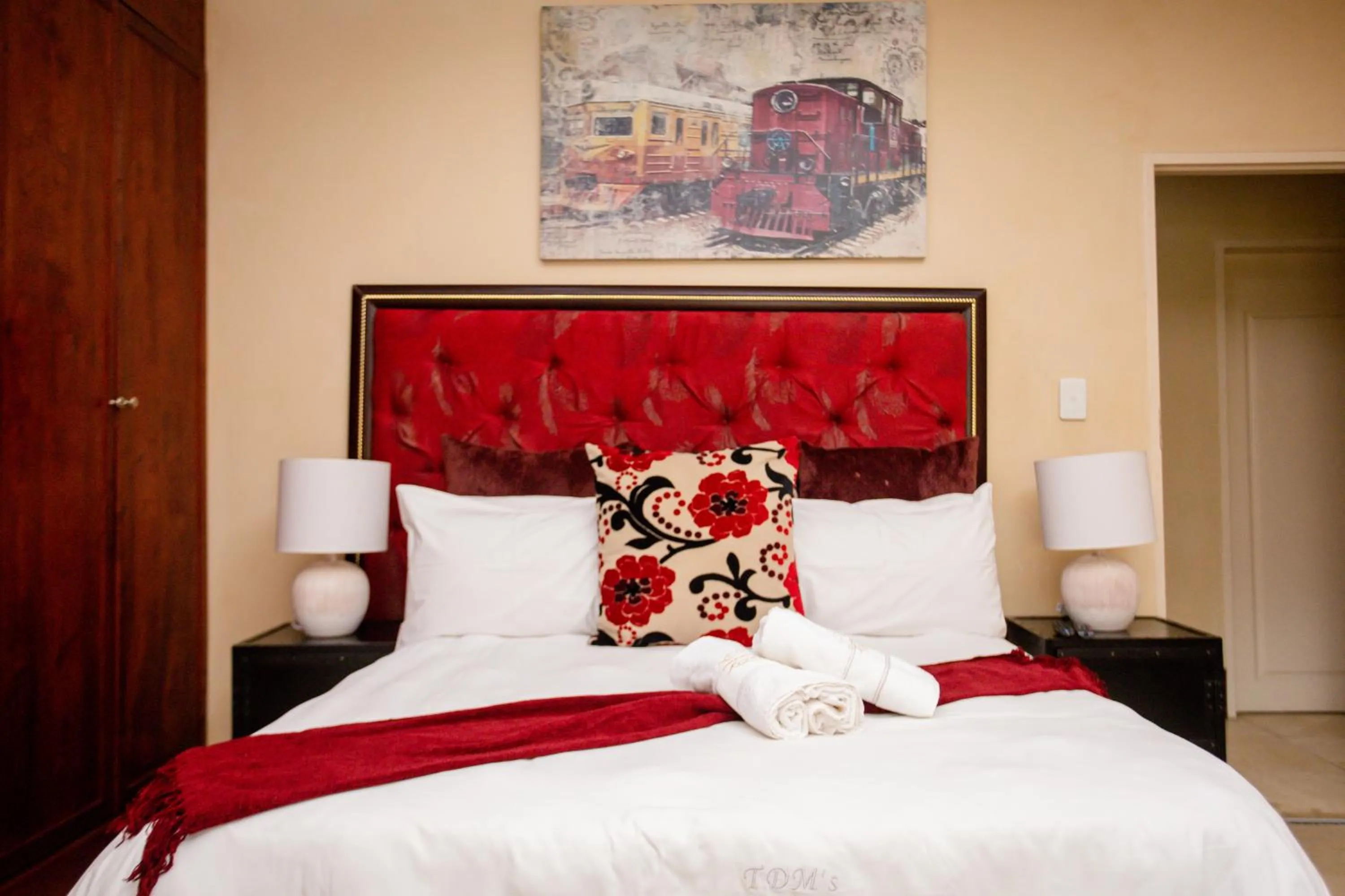 Bed in TDM's Boutique Guest House