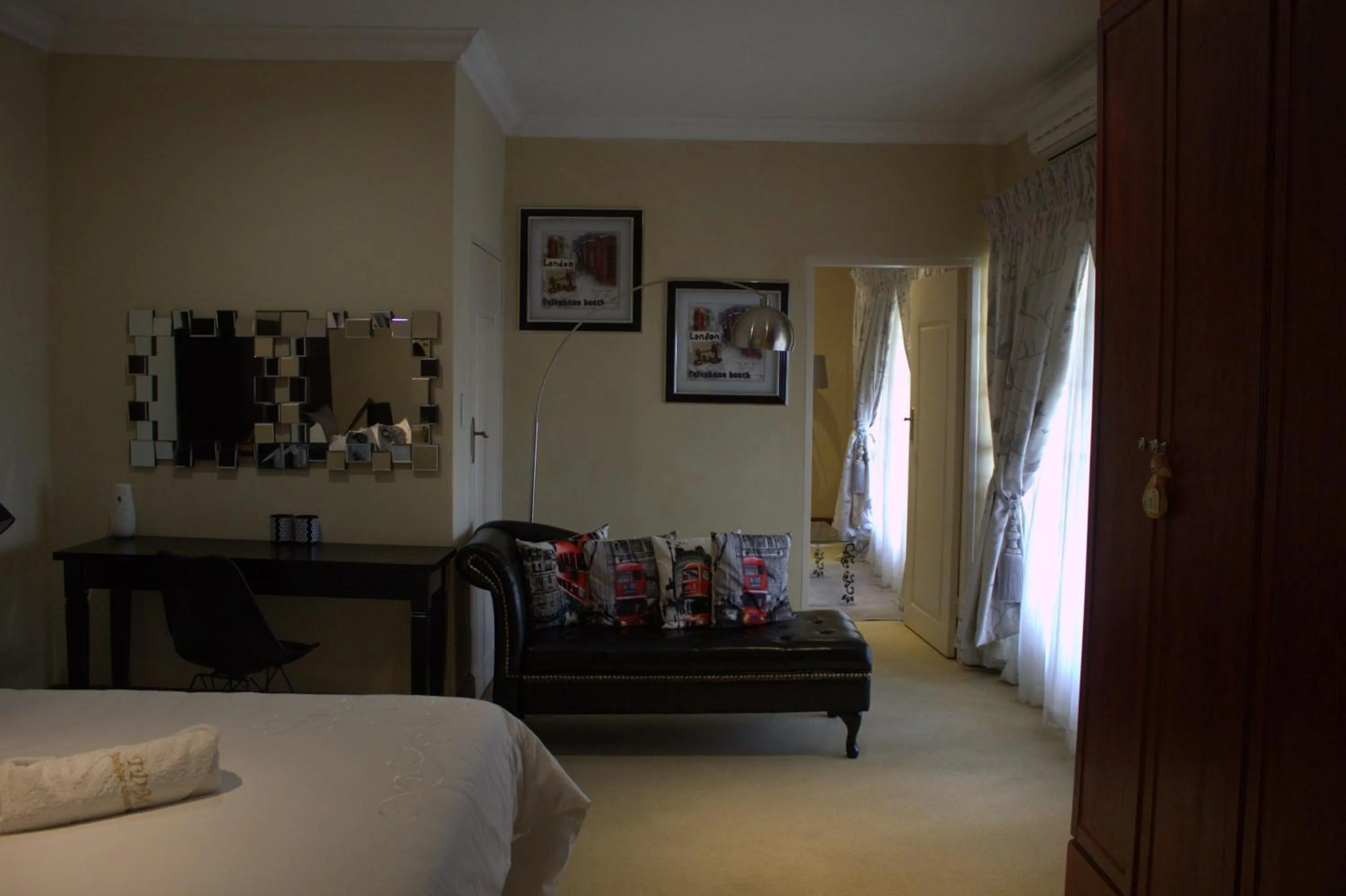 Seating area, Bed in TDM's Boutique Guest House