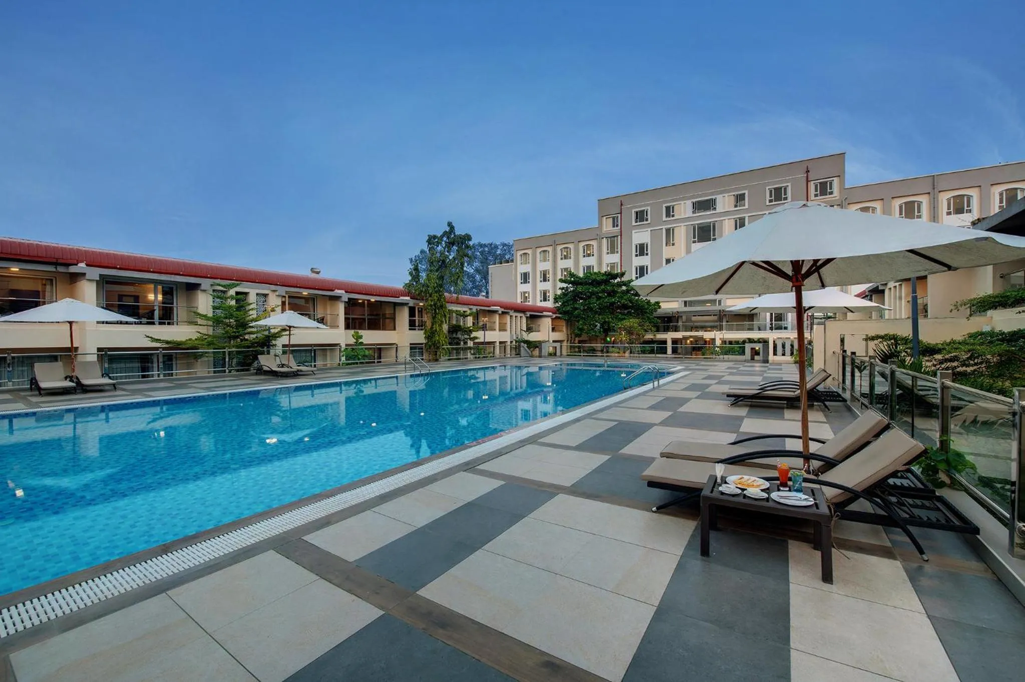 Swimming pool in The Fern Sardar Sarovar Resort Kevadia, Gujarat, Series by Marriott