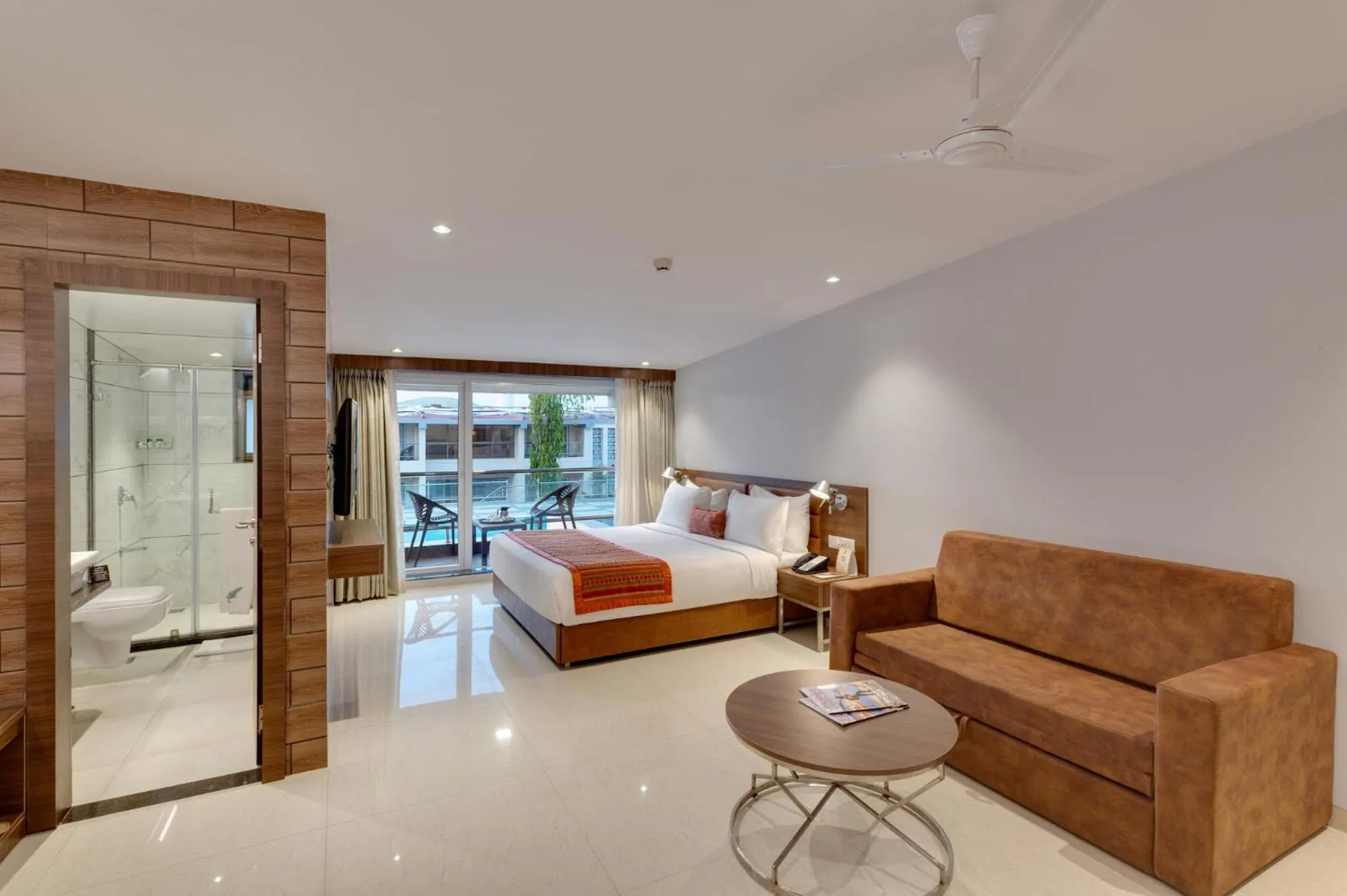 Seating area, Bed in The Fern Sardar Sarovar Resort Kevadia, Gujarat, Series by Marriott