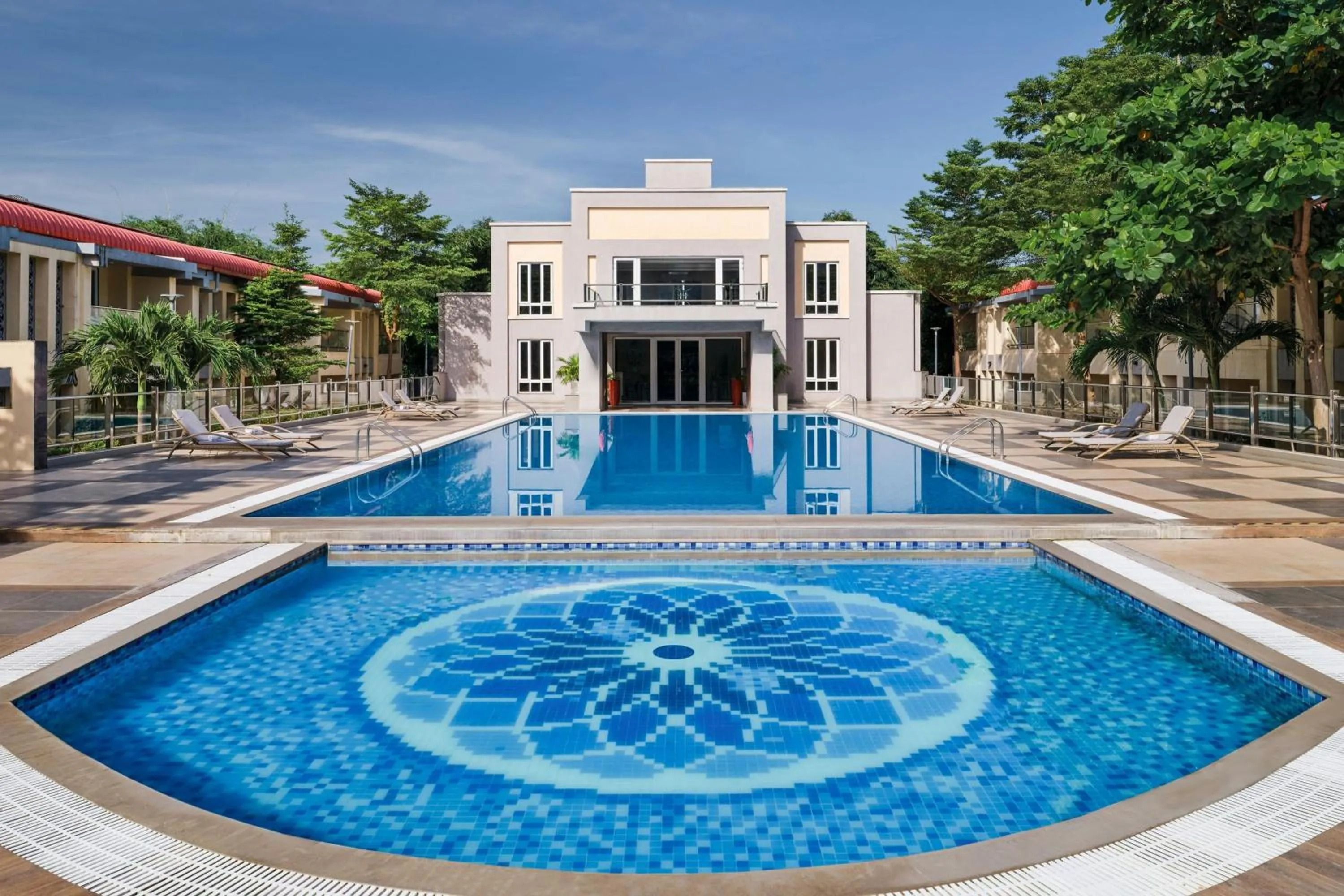 Swimming pool in The Fern Sardar Sarovar Resort Kevadia, Gujarat, Series by Marriott