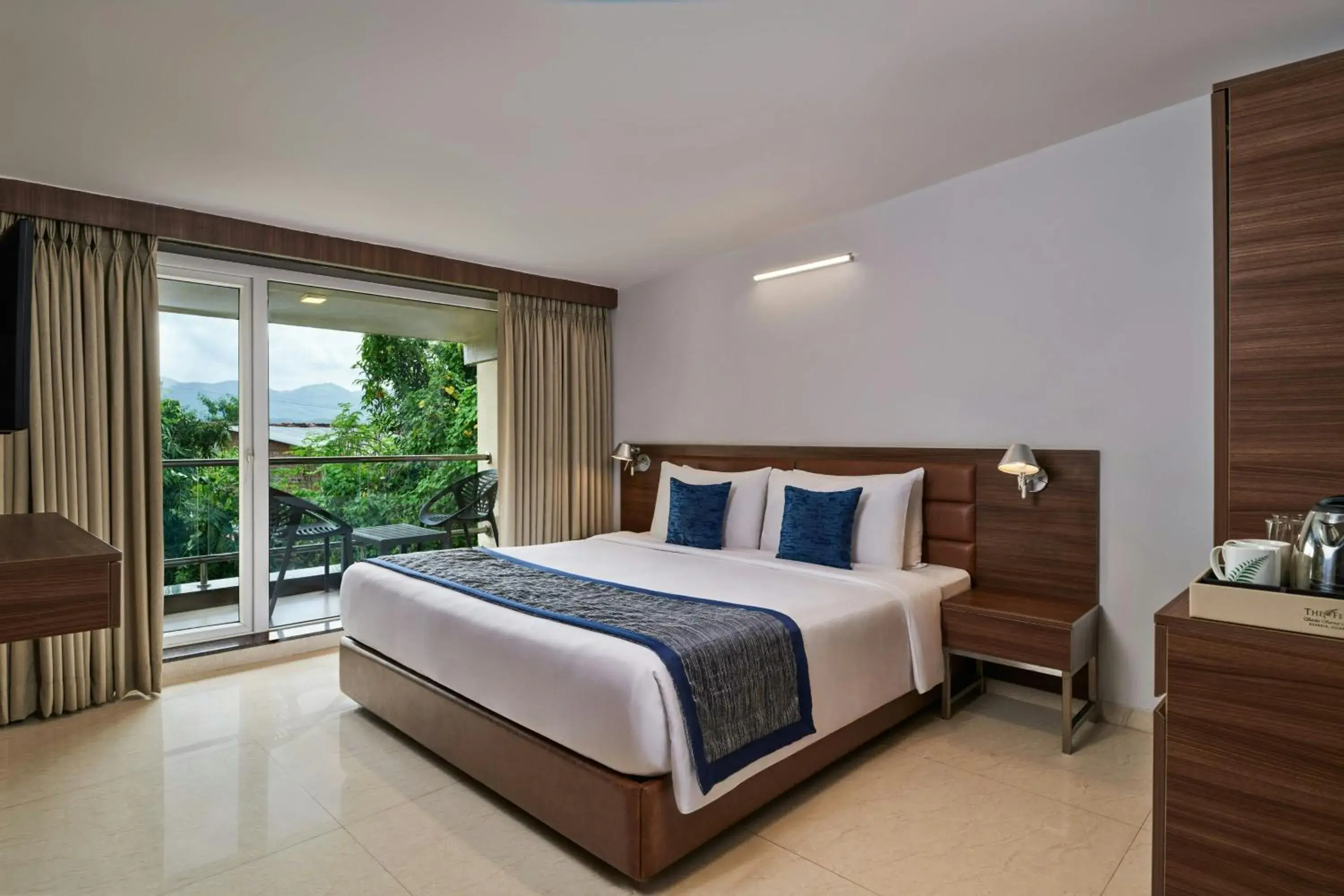 Hazel King Suite with Balcony and No View in The Fern Sardar Sarovar Resort Kevadia, Gujarat, Series by Marriott Hazel King Suite with Balcony and No View in The Fern Sardar Sarovar Resort Kevadia, Gujarat, Series by Marriott
