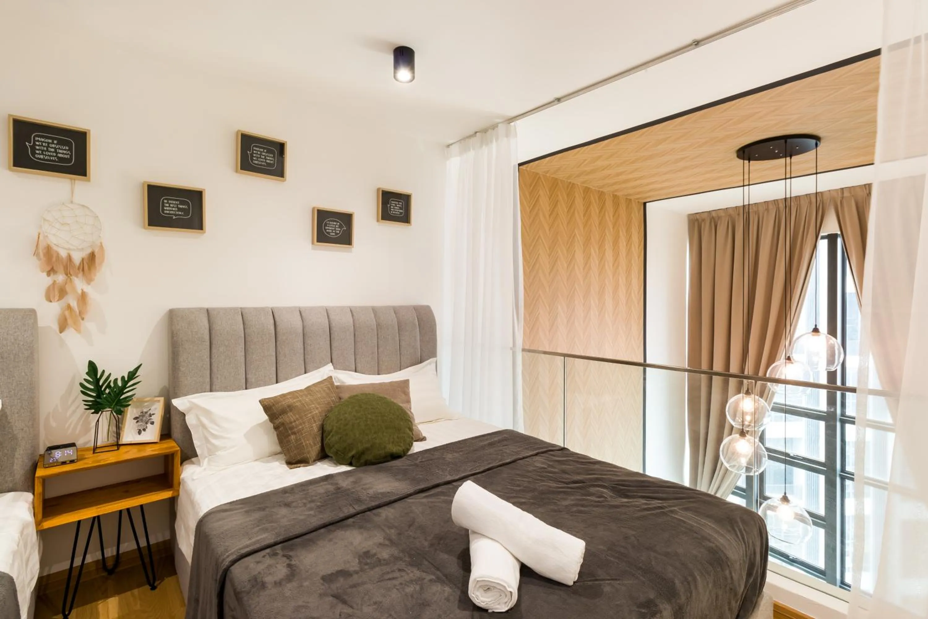 Bed in EkoCheras Cozy Suite by DreamScape