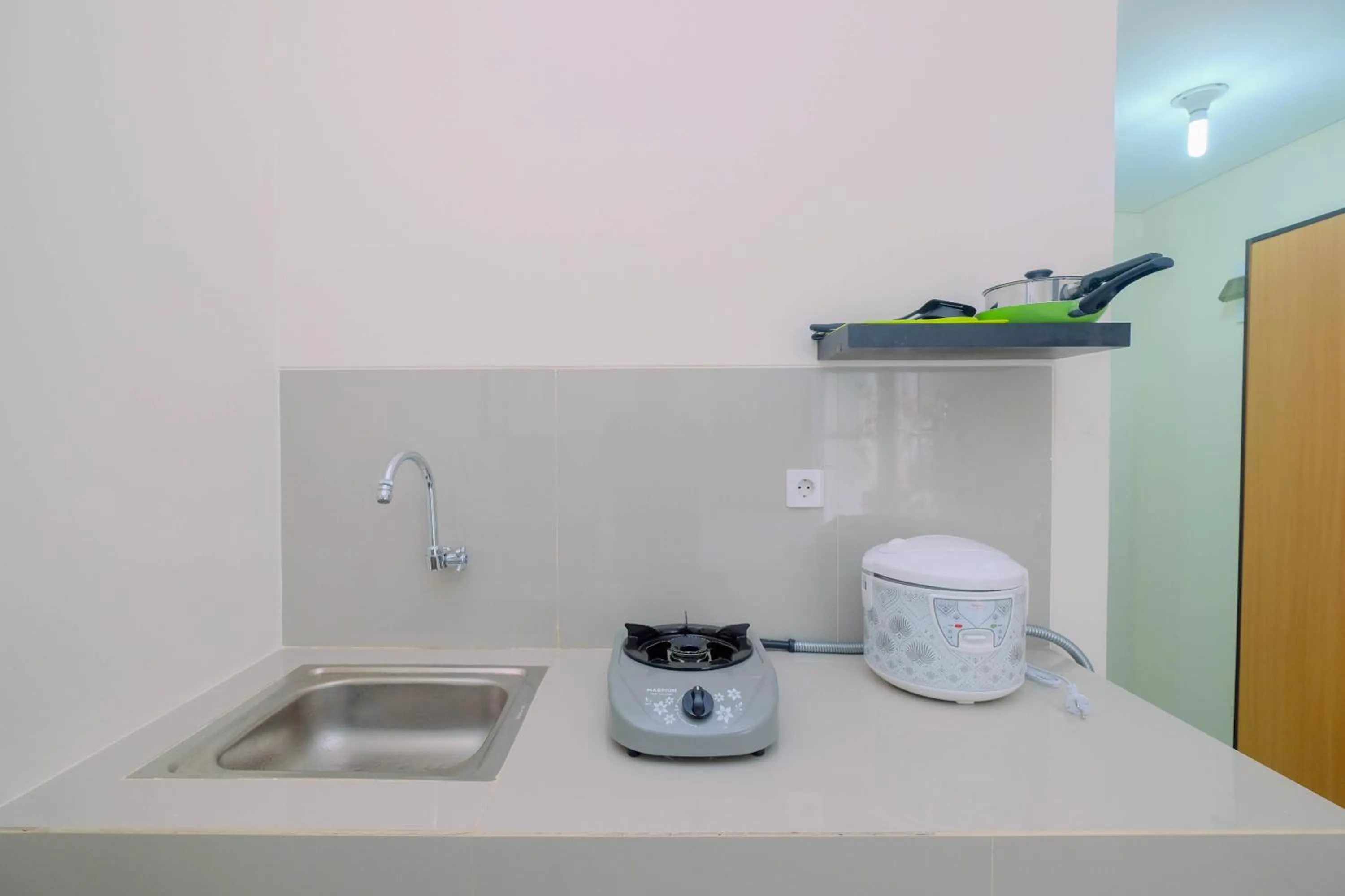 Minimalist Studio Apartment at Bogorienze By Travelio