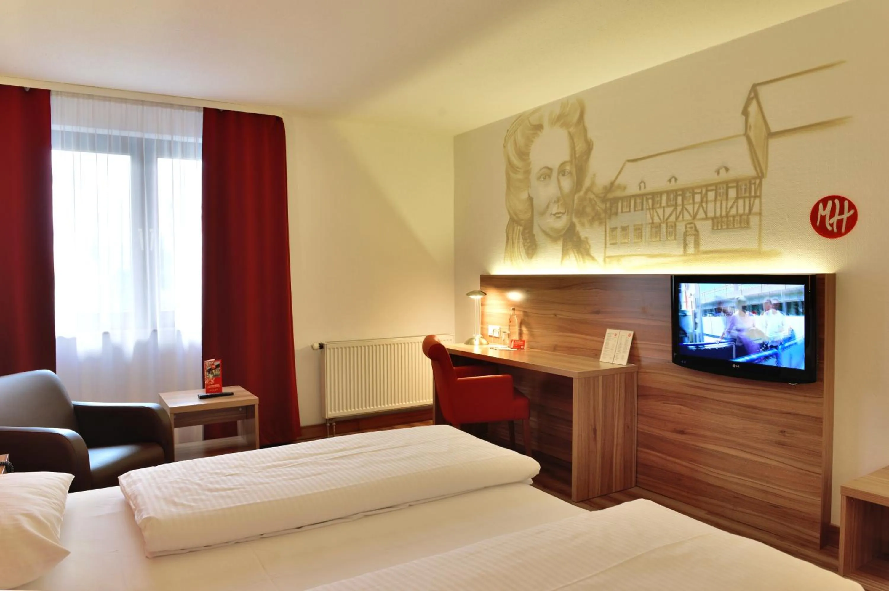 Photo of the whole room, Bed in Michel Hotel Wetzlar