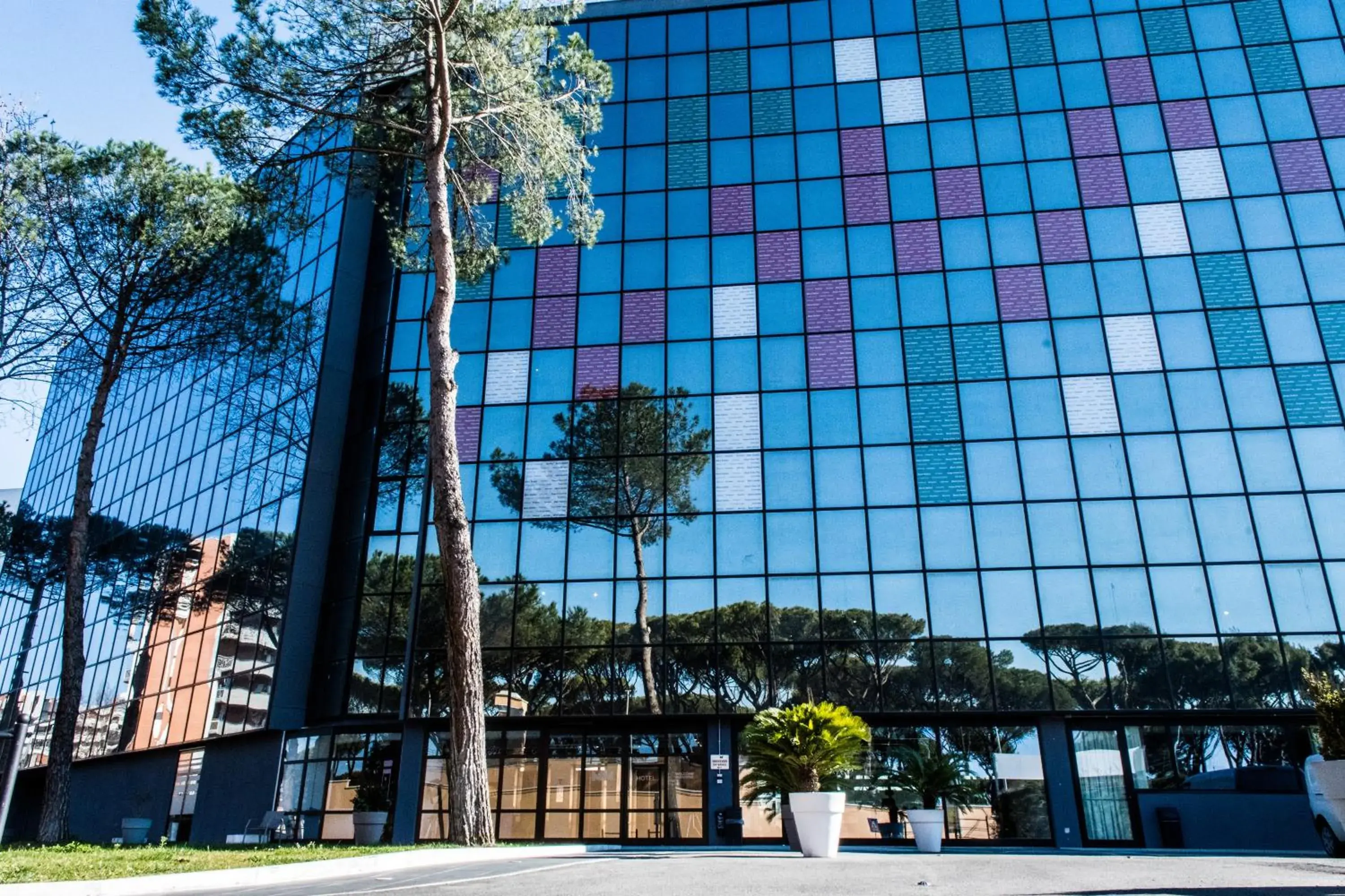 Property building in Mercure Roma Cinecitta Property building in Mercure Roma Cinecitta