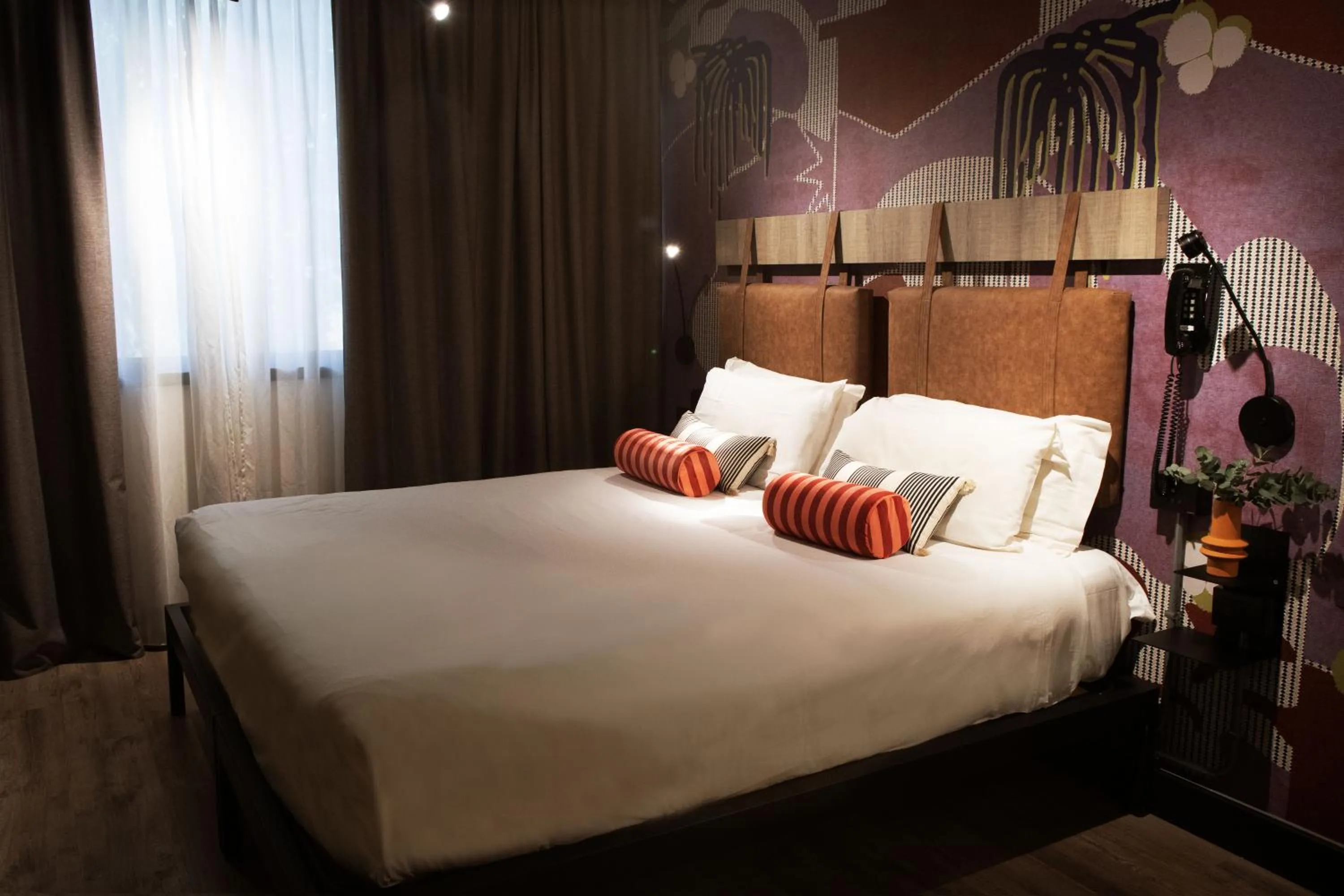 Bed in Mercure Roma Cinecitta