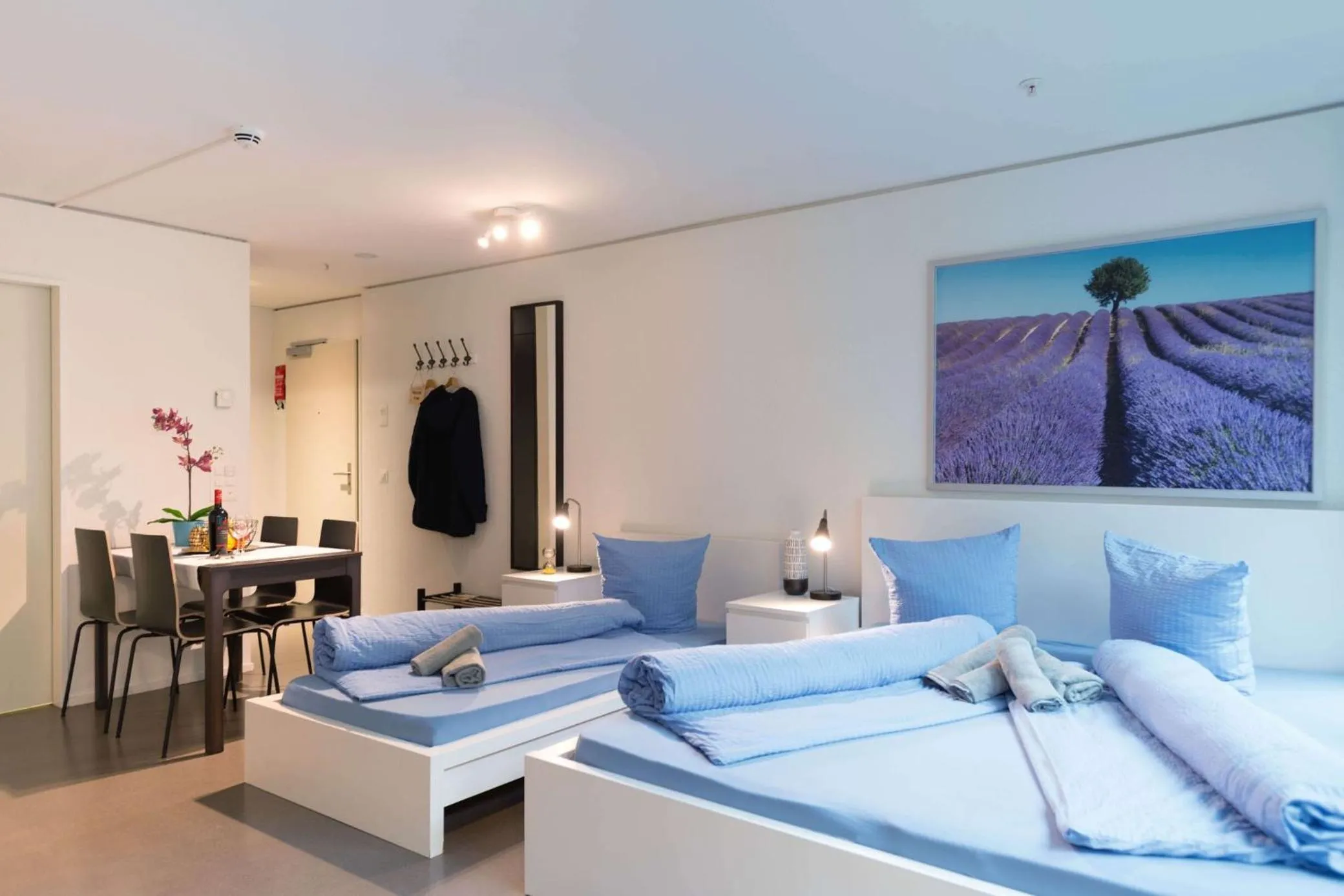 Bed in HITrental Allmend Comfort Studios