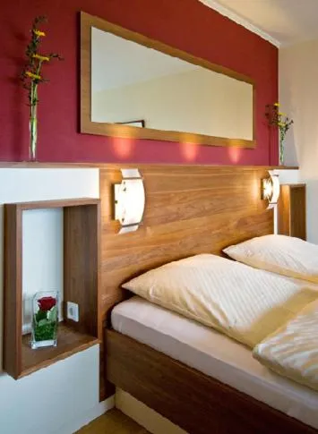 Photo of the whole room, Bed in Hotel Am Rosenberg