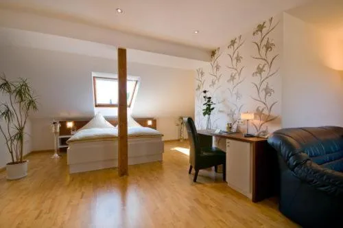 Photo of the whole room, Bed in Hotel Am Rosenberg