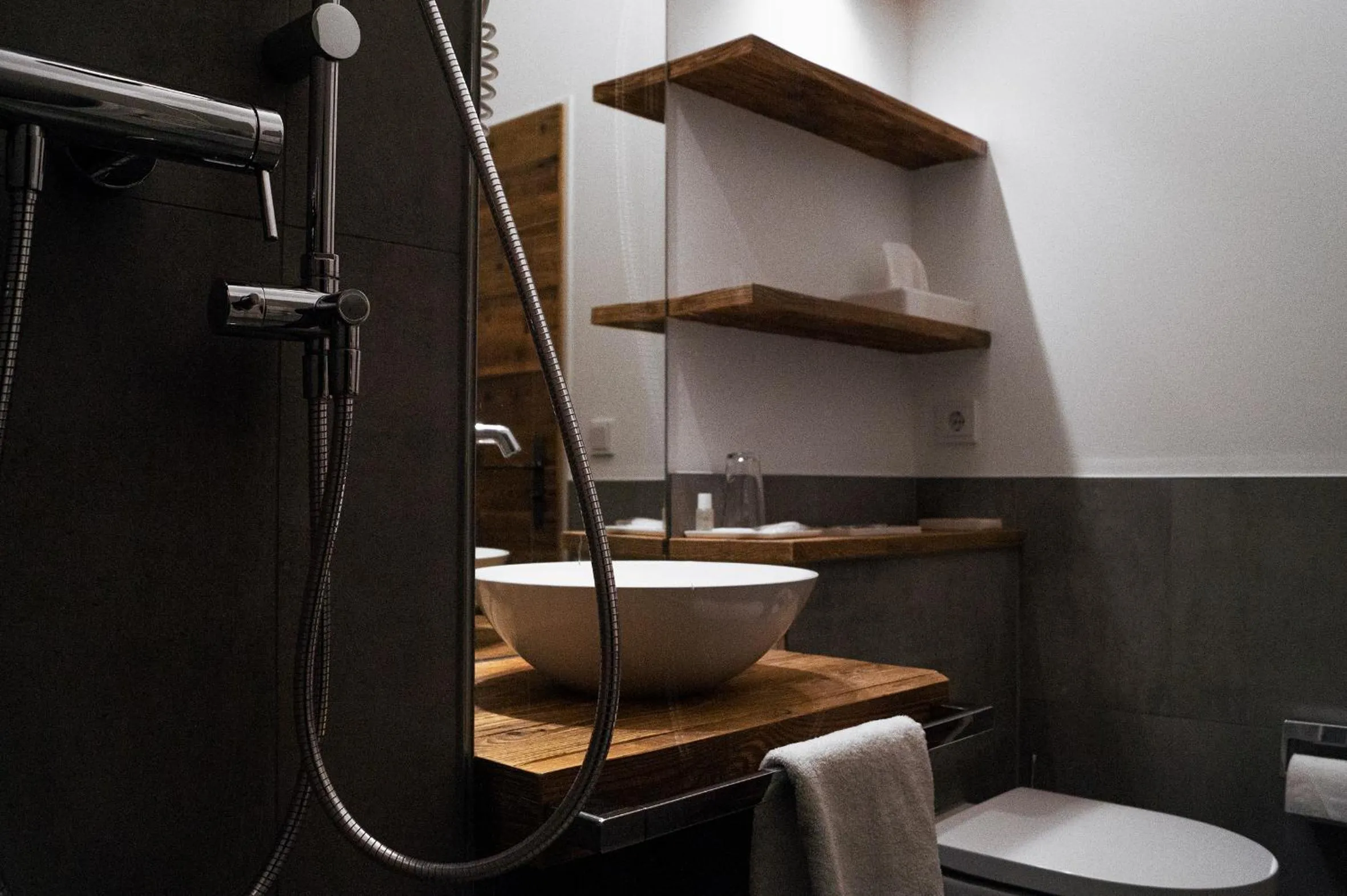 Bathroom in Hotel Almwirt