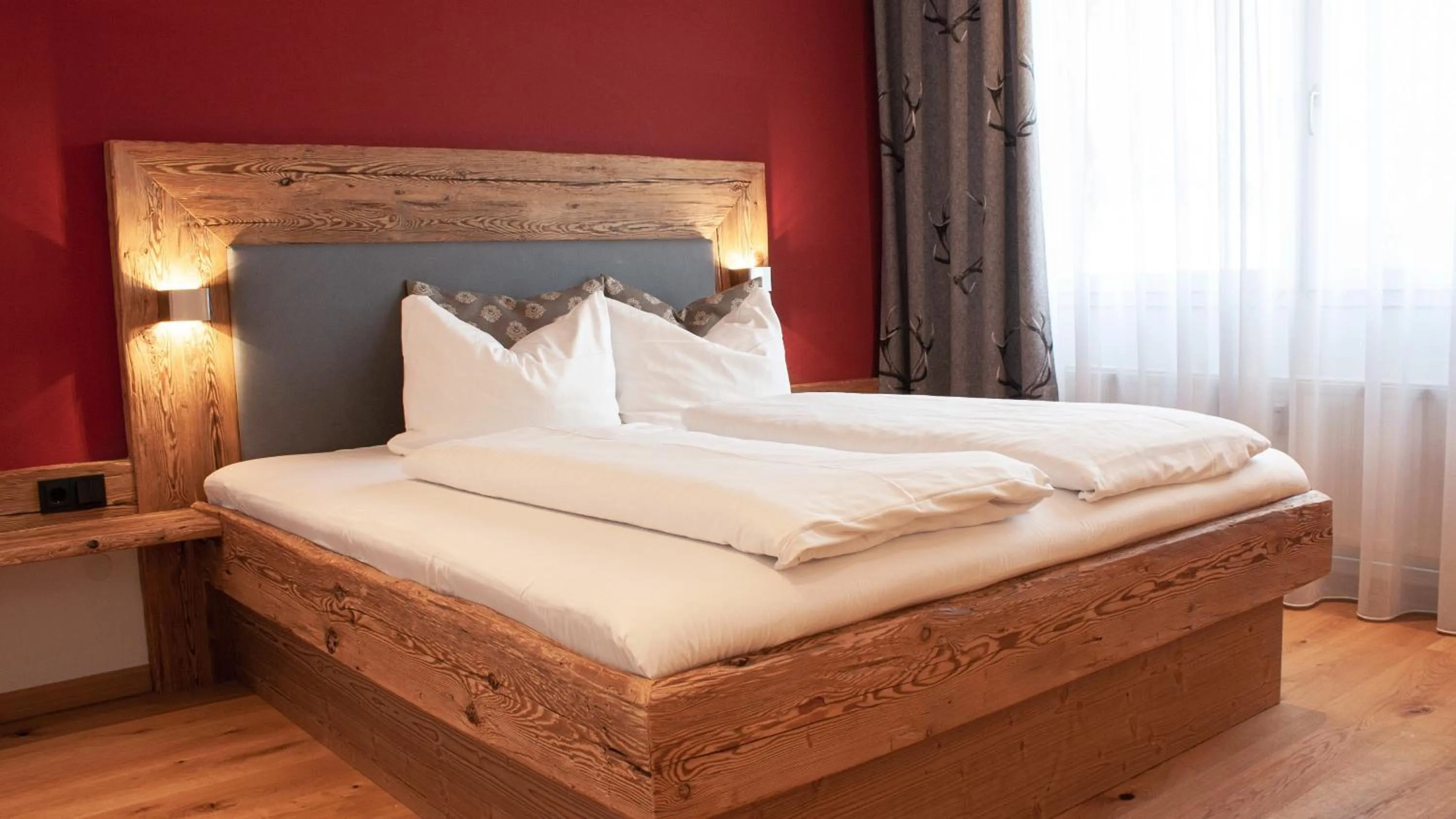 Bed in Hotel Almwirt