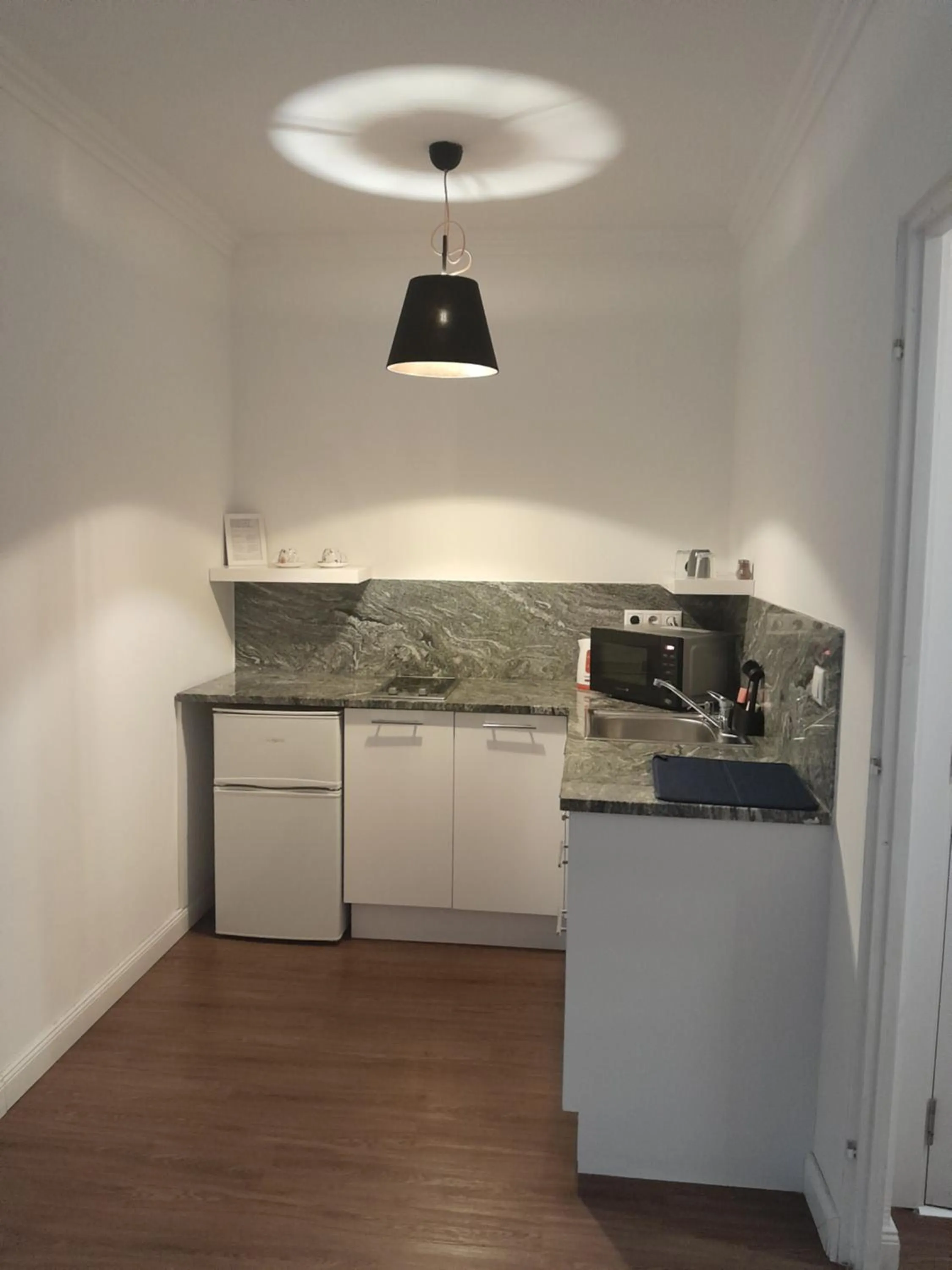 Kitchen or kitchenette in Éjjeli Bagoly Étterem és Panzió