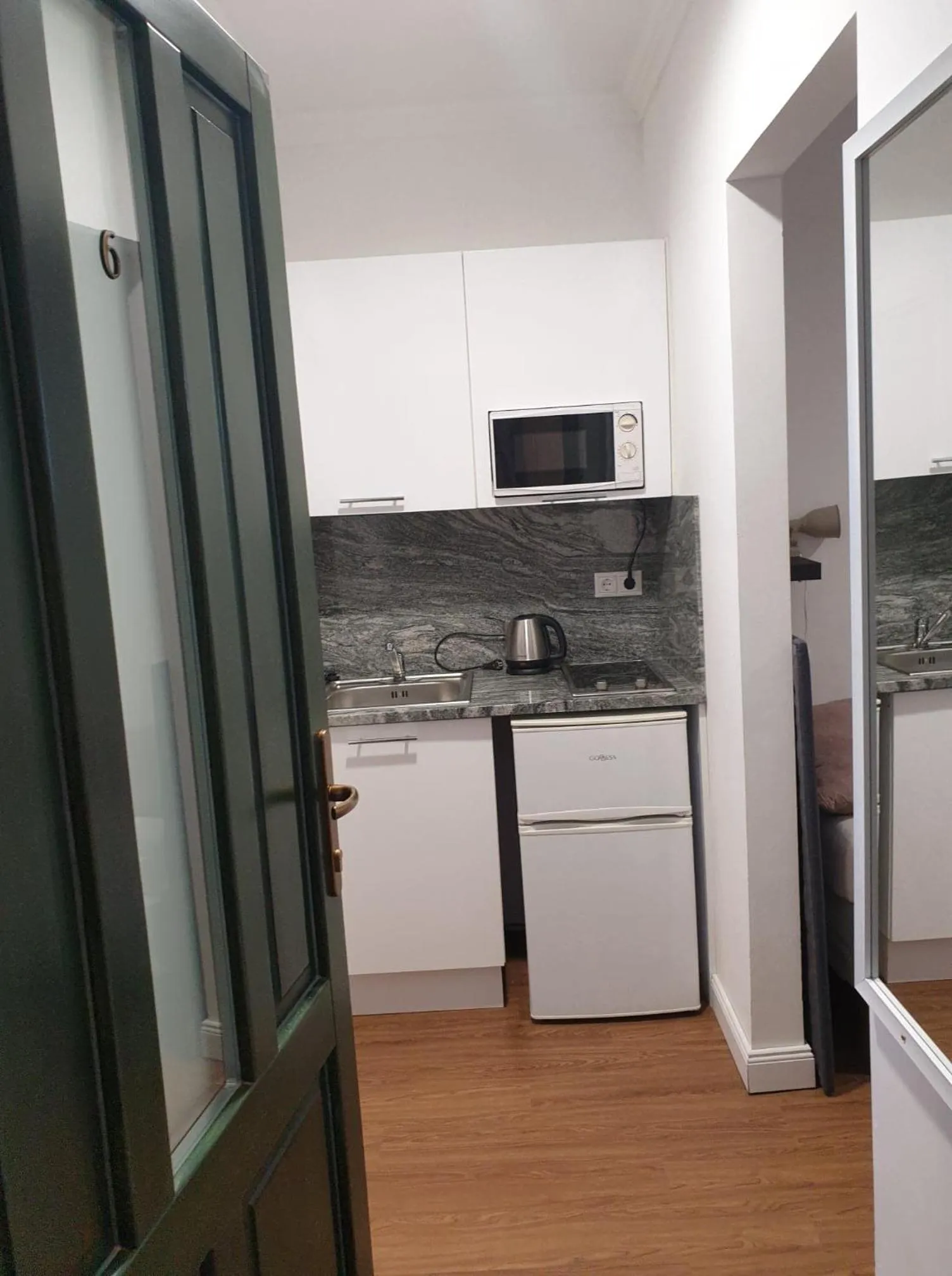 Kitchen or kitchenette in Éjjeli Bagoly Étterem és Panzió