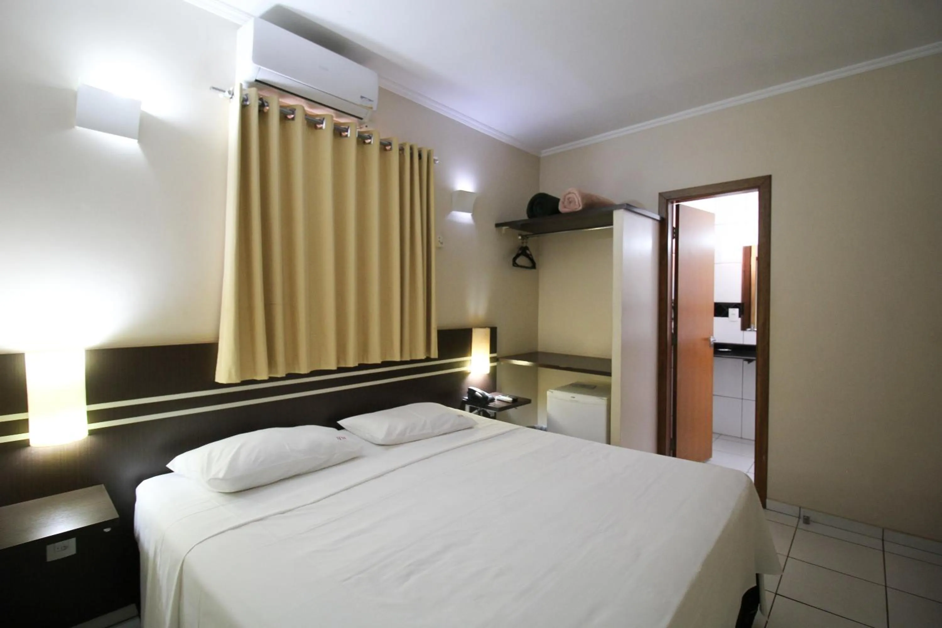 Bed in VOA Pousada Água Eterna