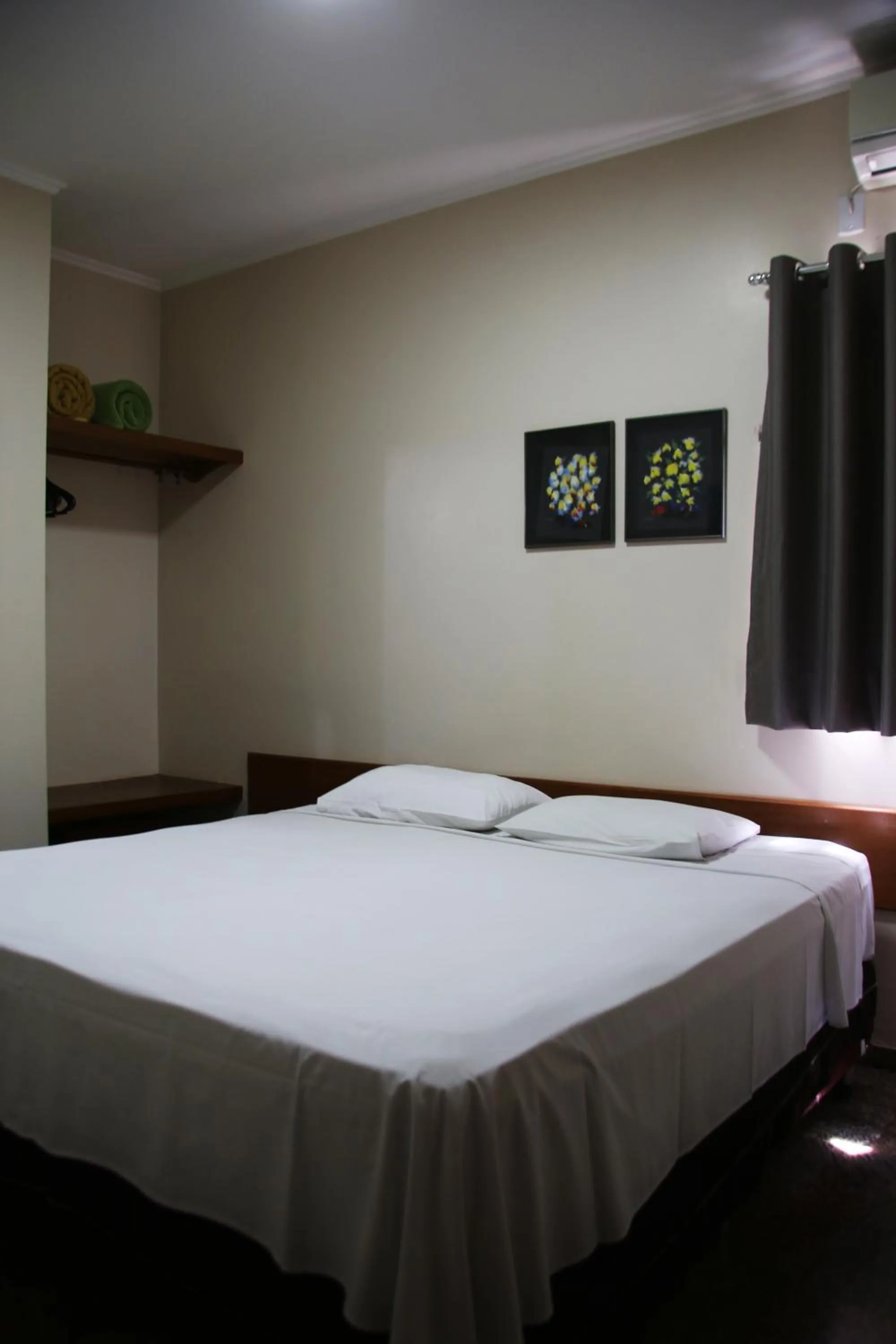 Bed in VOA Pousada Água Eterna