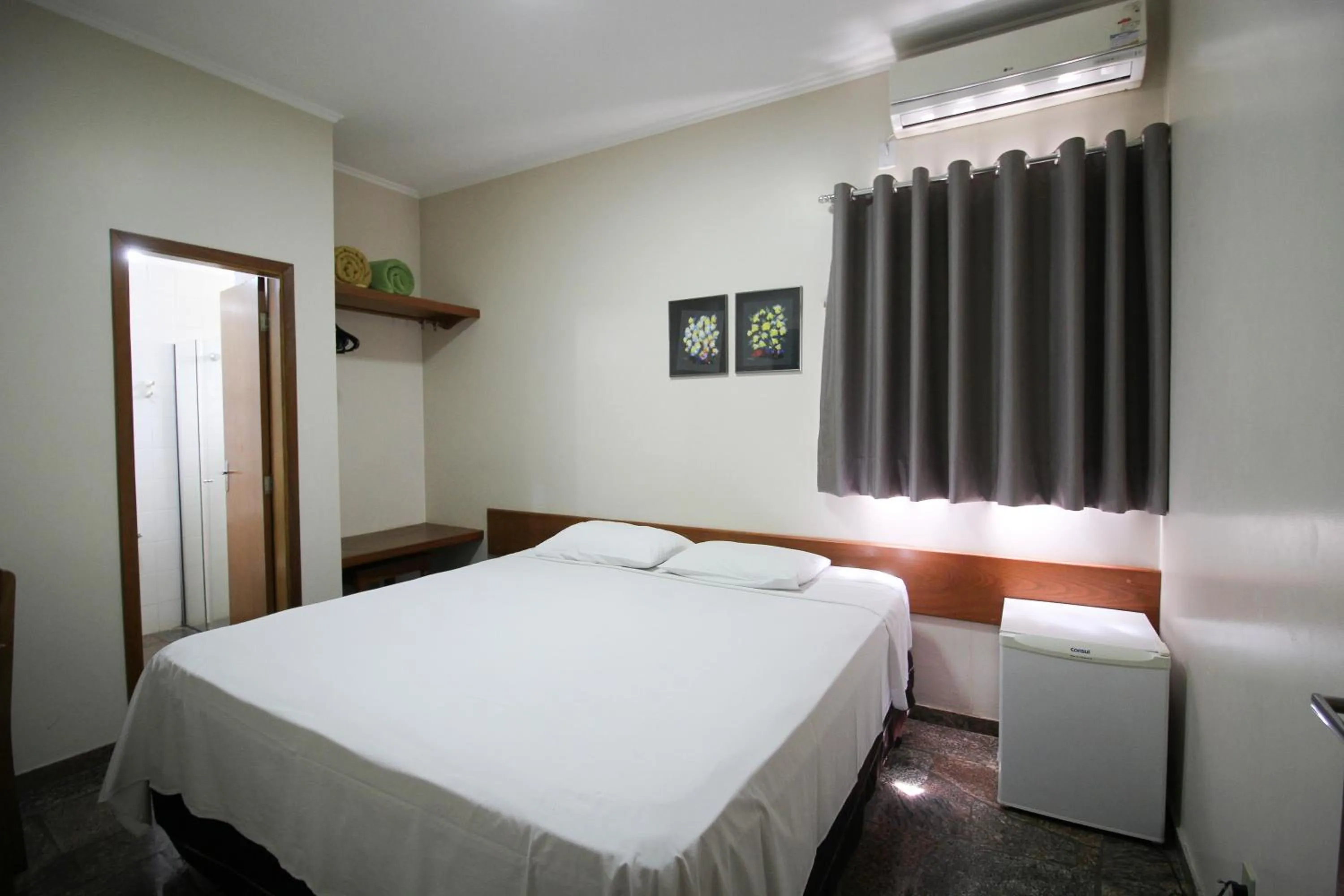 Bed in VOA Pousada Água Eterna