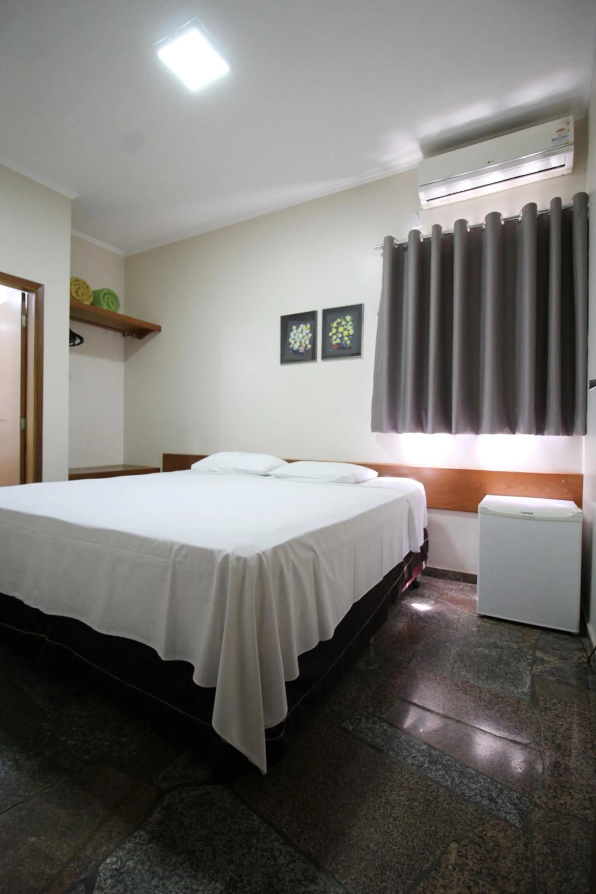 Bed in VOA Pousada Água Eterna