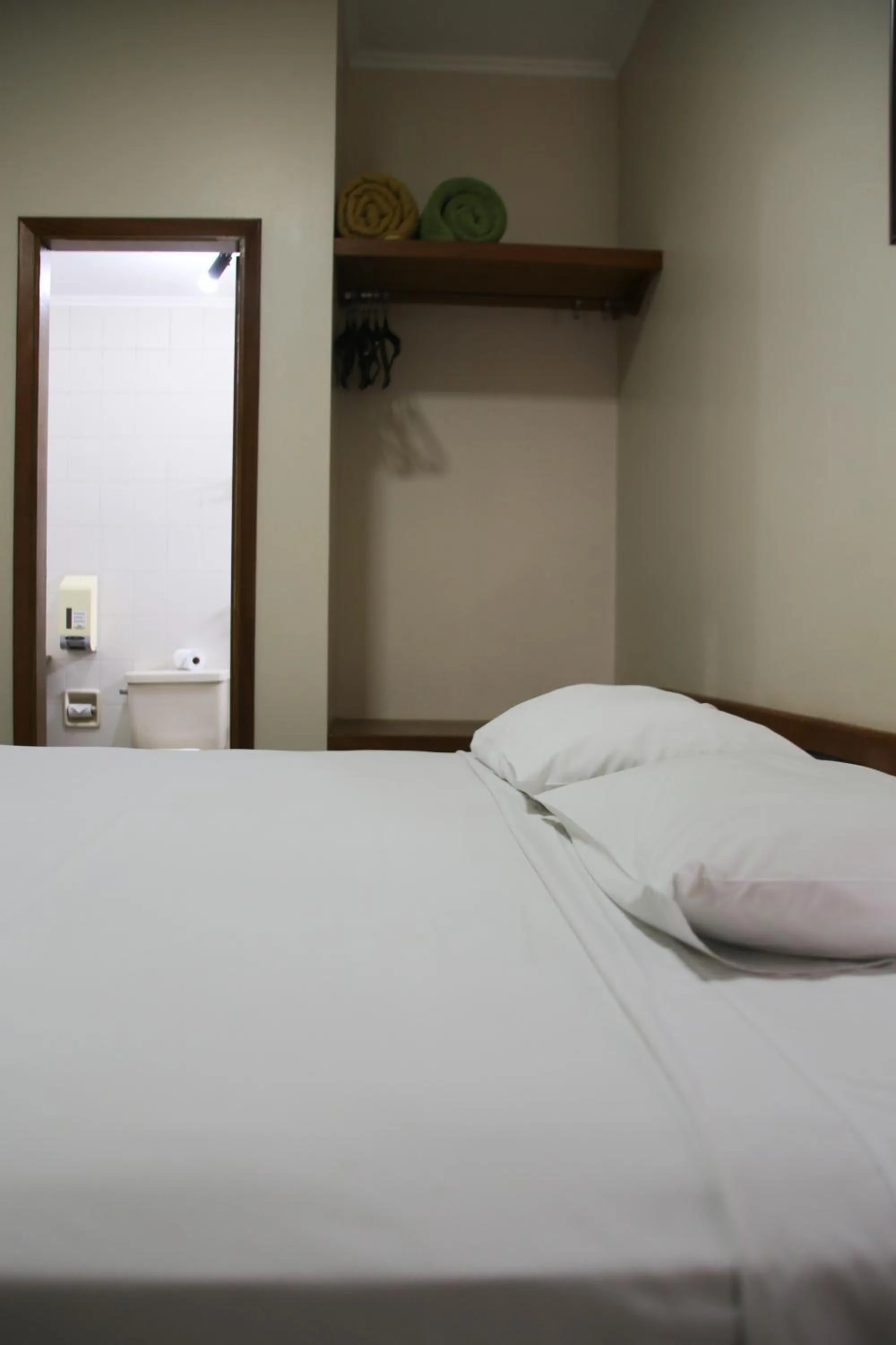 Bed in VOA Pousada Água Eterna