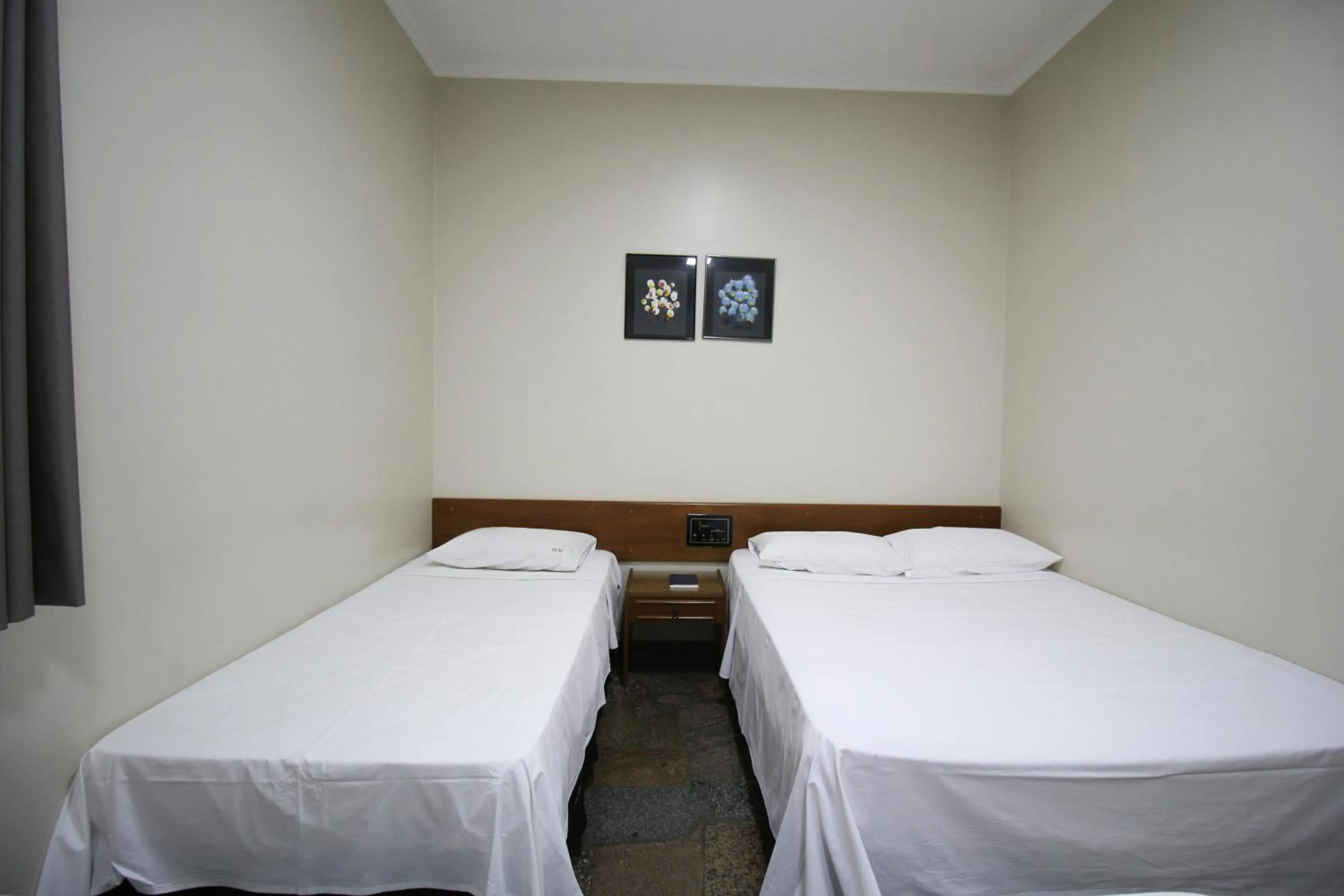 Bed in VOA Pousada Água Eterna