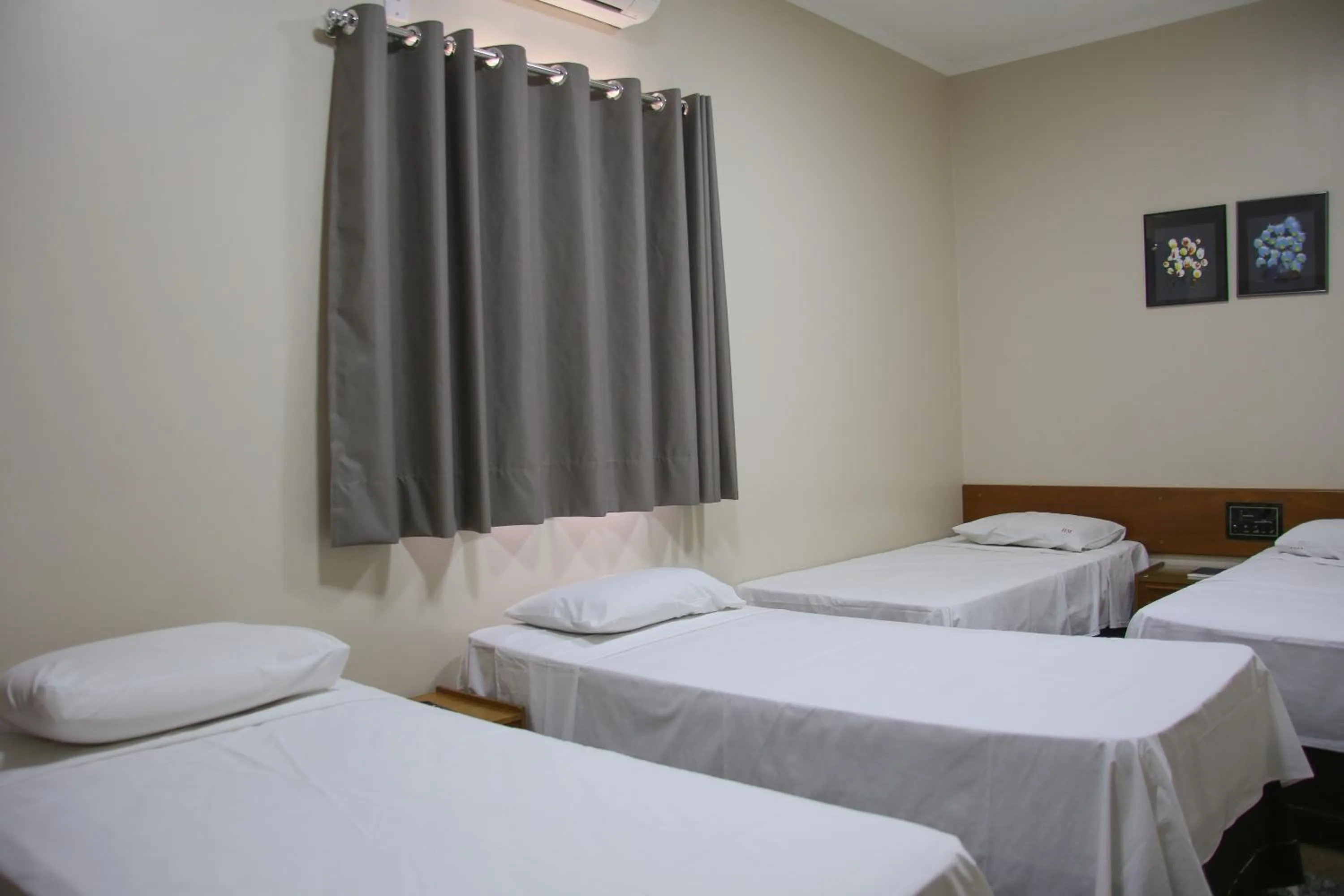 Bed in VOA Pousada Água Eterna