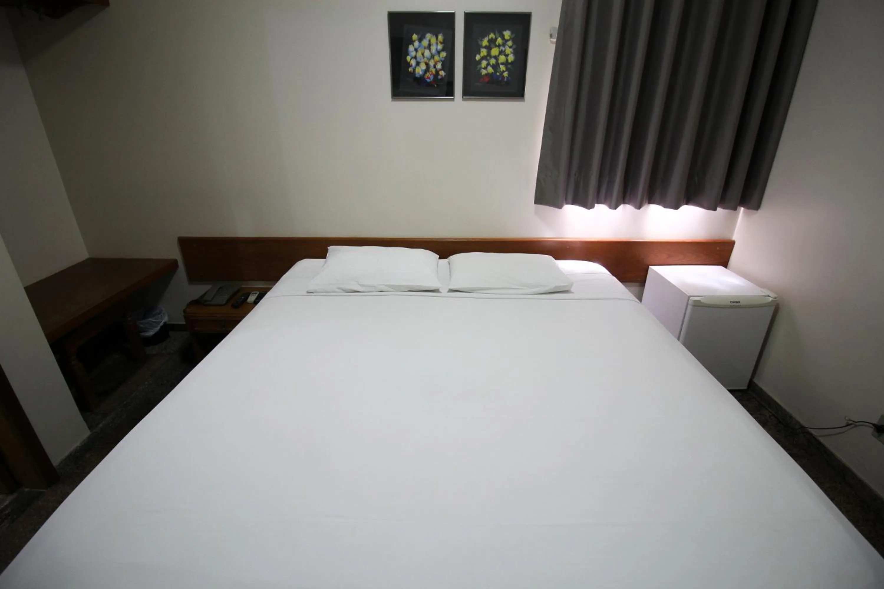 Bed in VOA Pousada Água Eterna