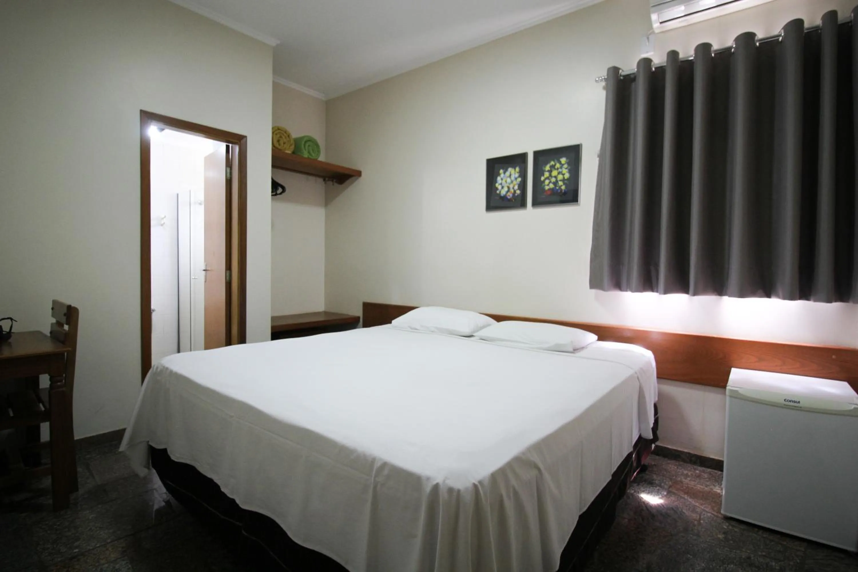 Bed in VOA Pousada Água Eterna