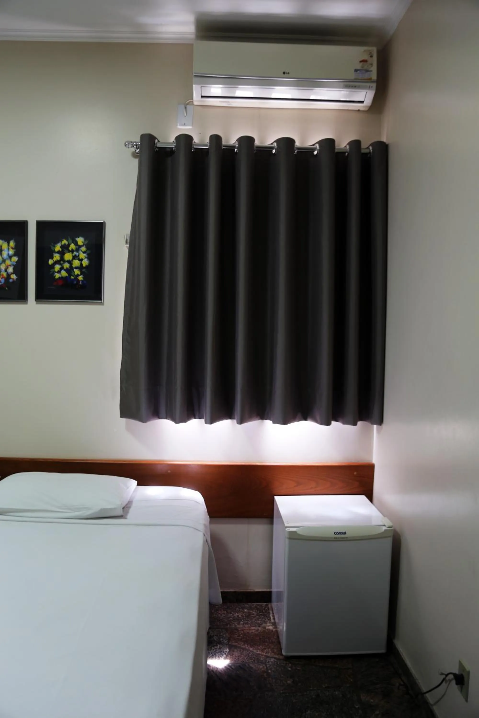 Bed in VOA Pousada Água Eterna