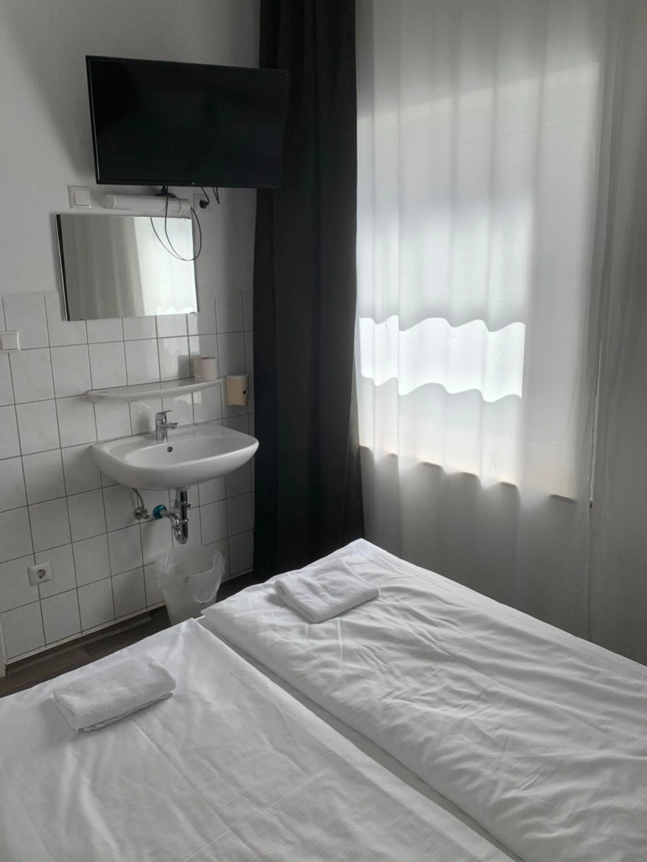 Bed in Hotel Bee Fang