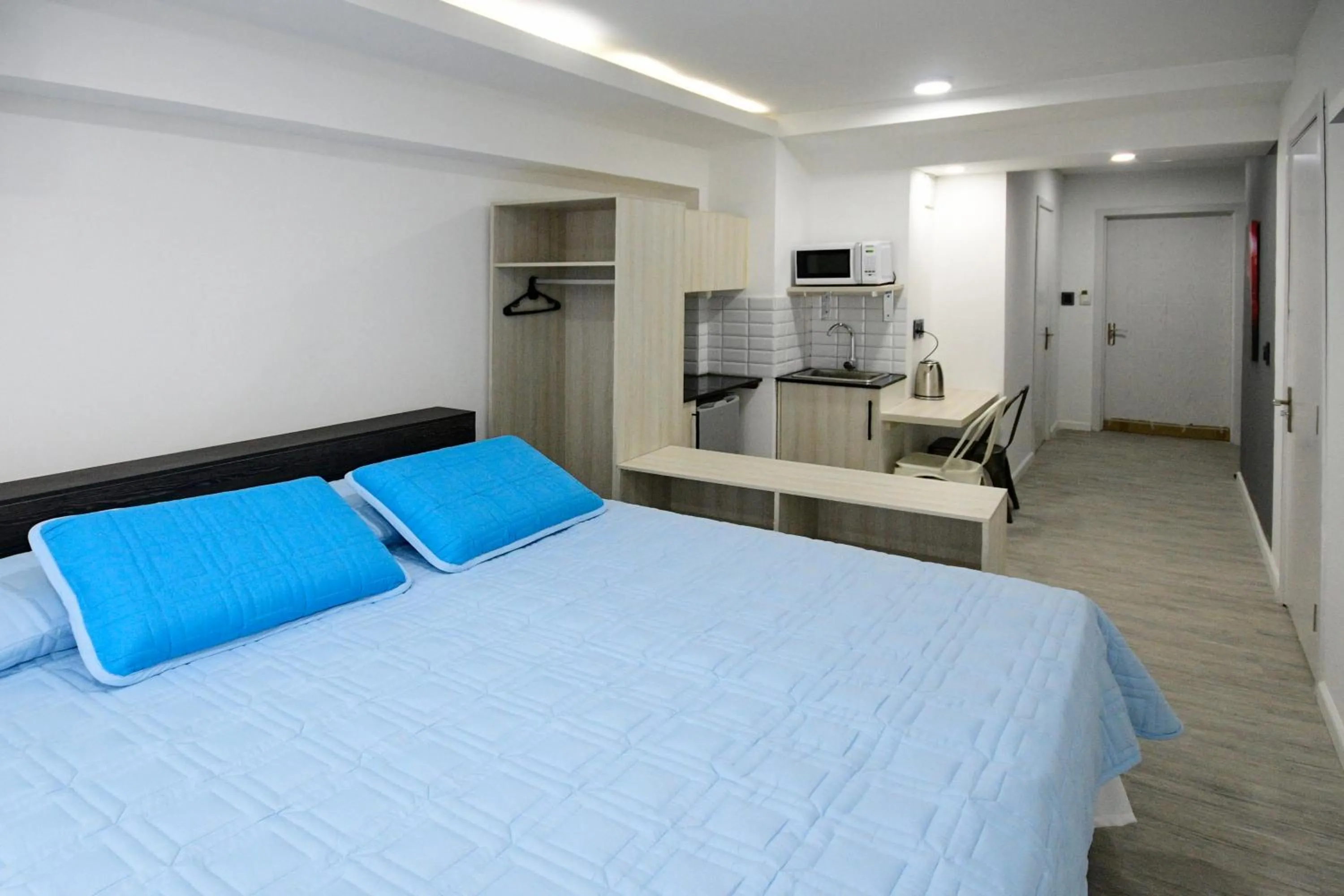 Bed in Quijano Hotel - Aparts & Suites